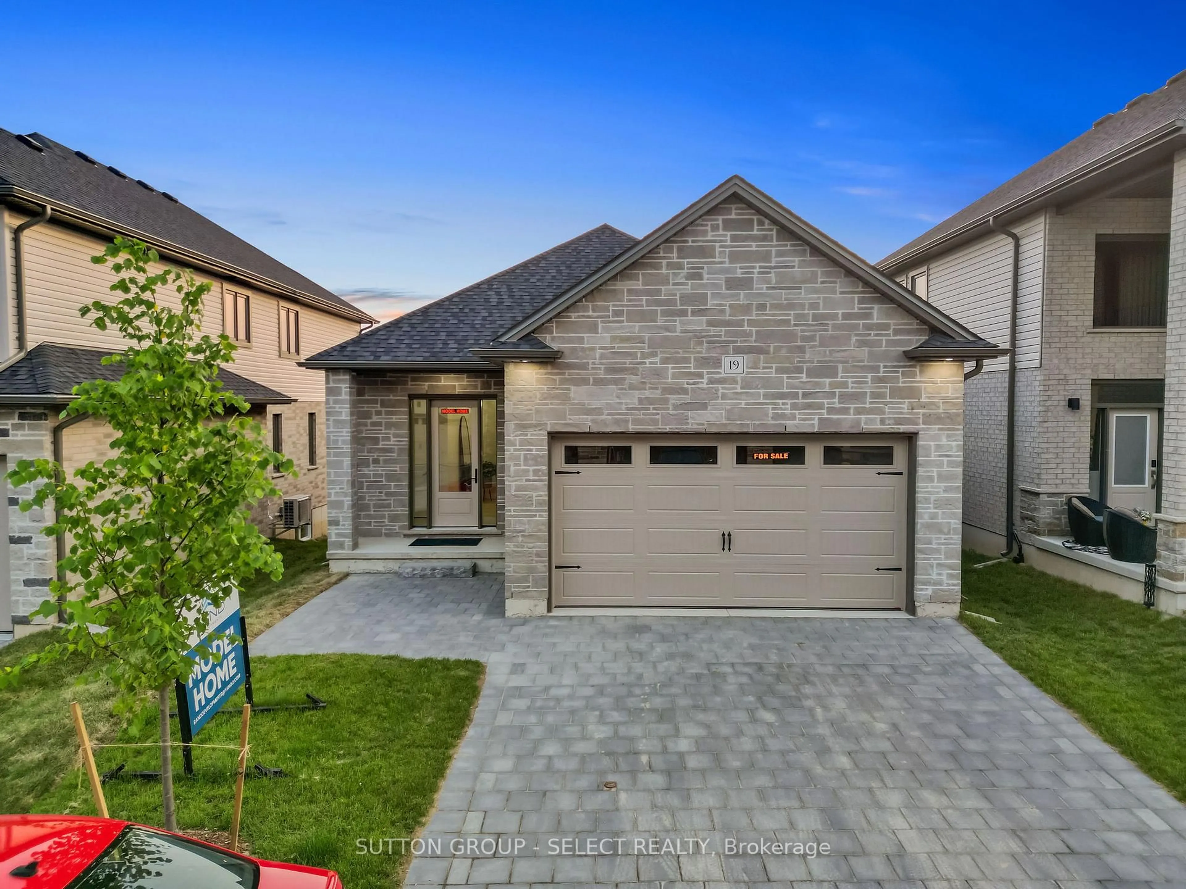 Home with brick exterior material, street for 7966 FALLON Dr #19, Lucan Biddulph Ontario N0M 1V0