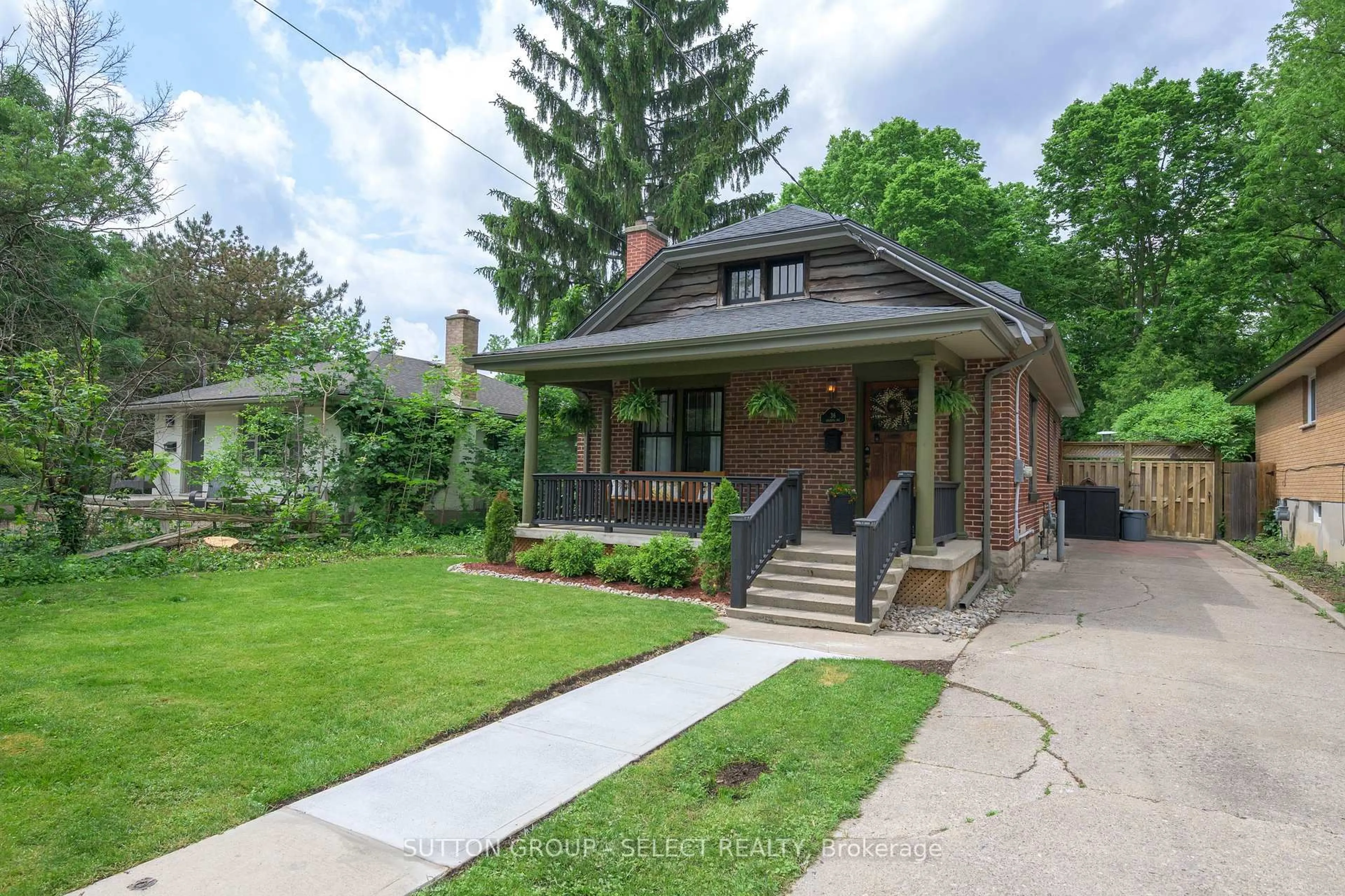 Home with brick exterior material, street for 36 Duchess Ave, London South Ontario N6C 1N2