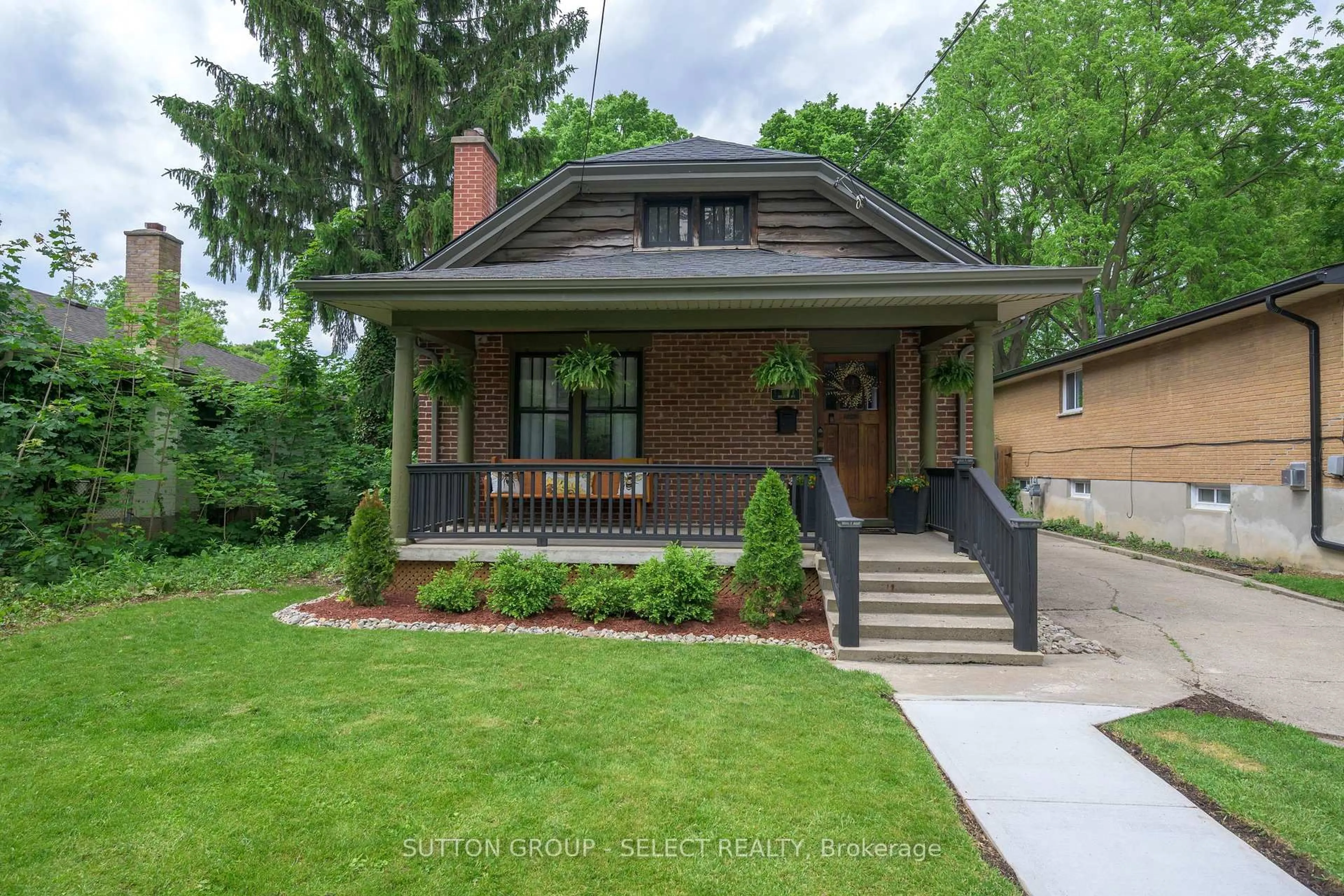 Home with brick exterior material, street for 36 Duchess Ave, London South Ontario N6C 1N2