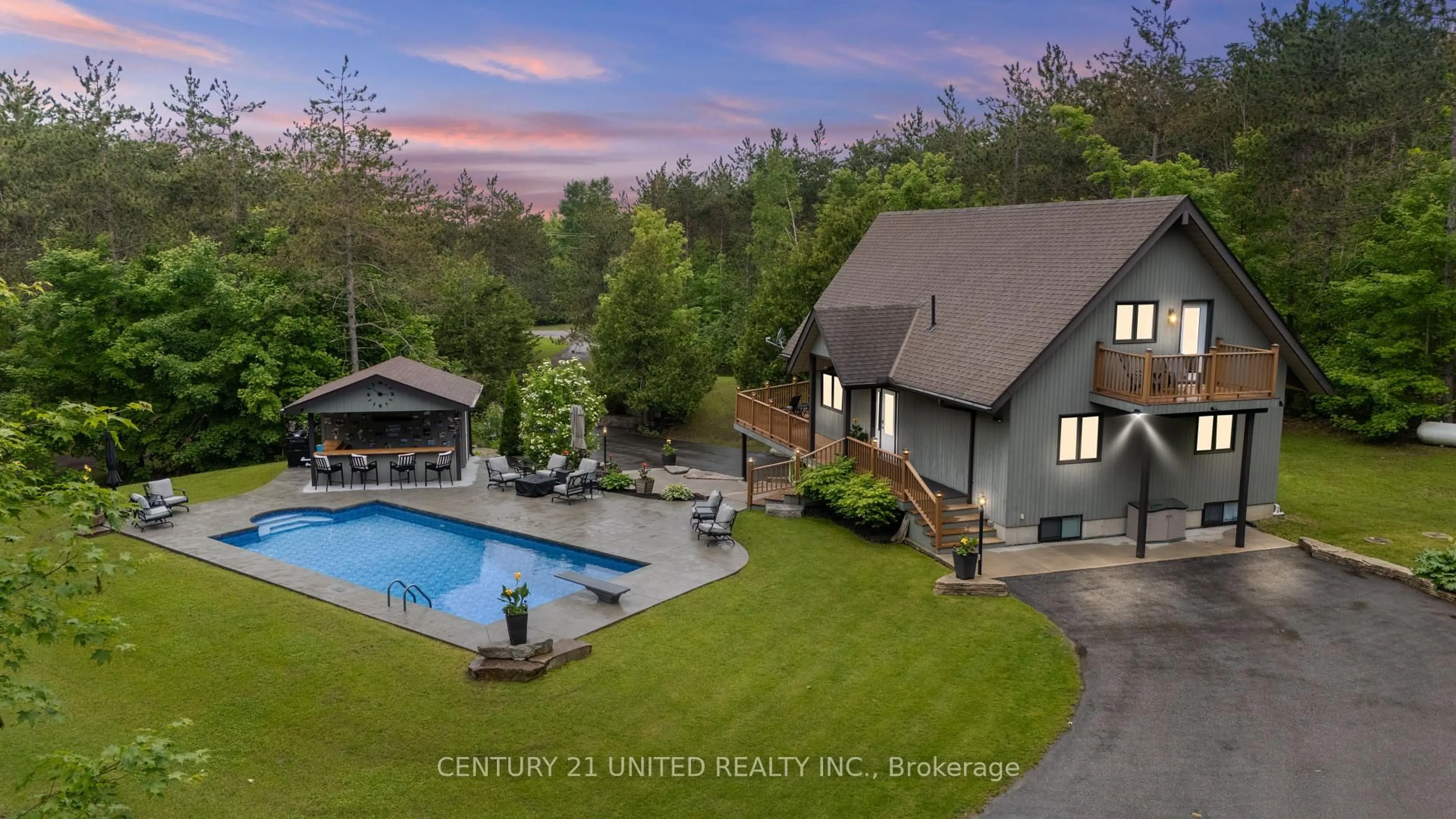 A pic from outside/outdoor area/front of a property/back of a property/a pic from drone, mountain view for 113 Sugarbush Blvd, Trent Lakes Ontario K0L 1J0