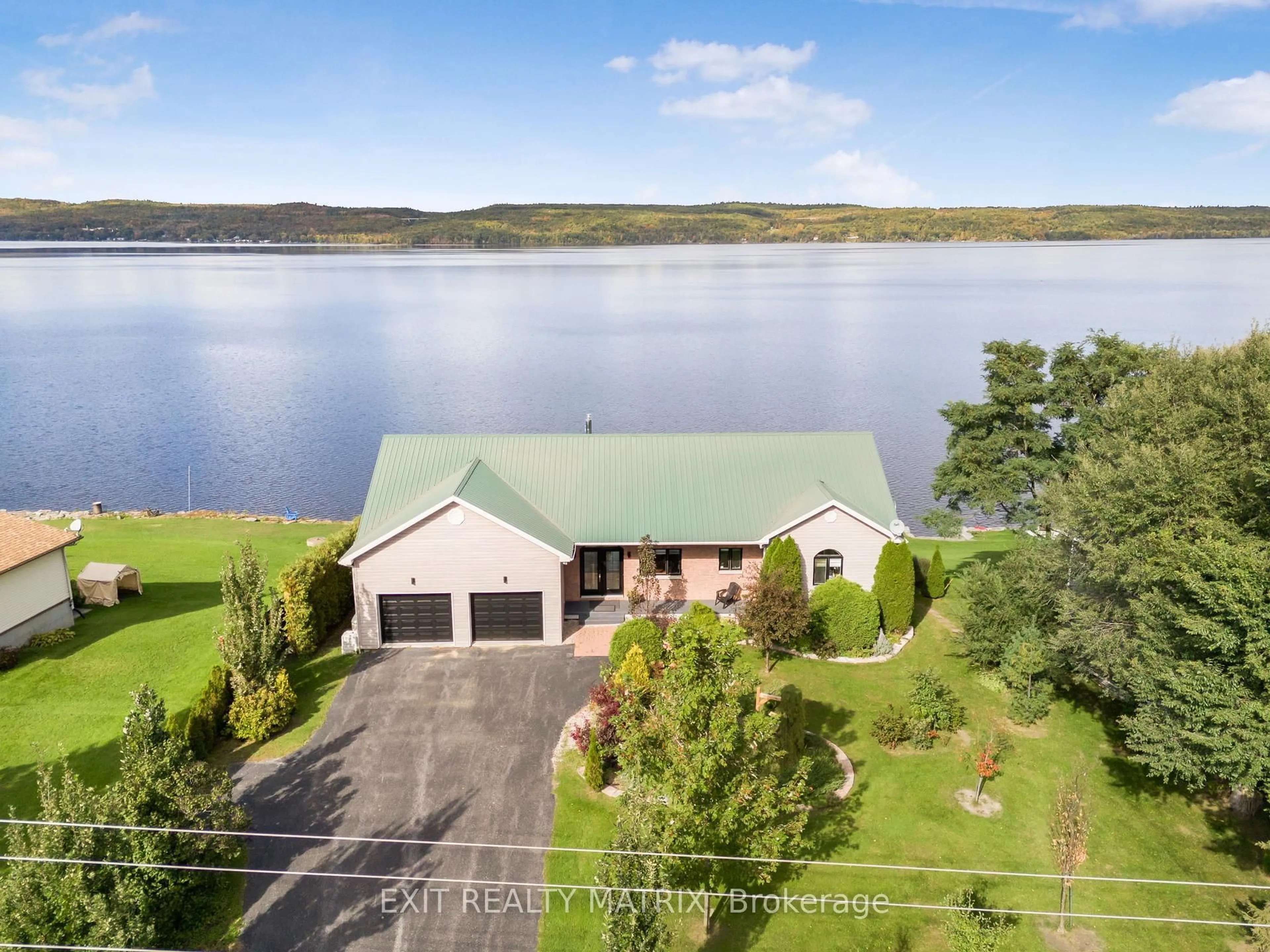 A pic from outside/outdoor area/front of a property/back of a property/a pic from drone, water/lake/river/ocean view for 1624 Bay Rd, Champlain Ontario K0B 1K0