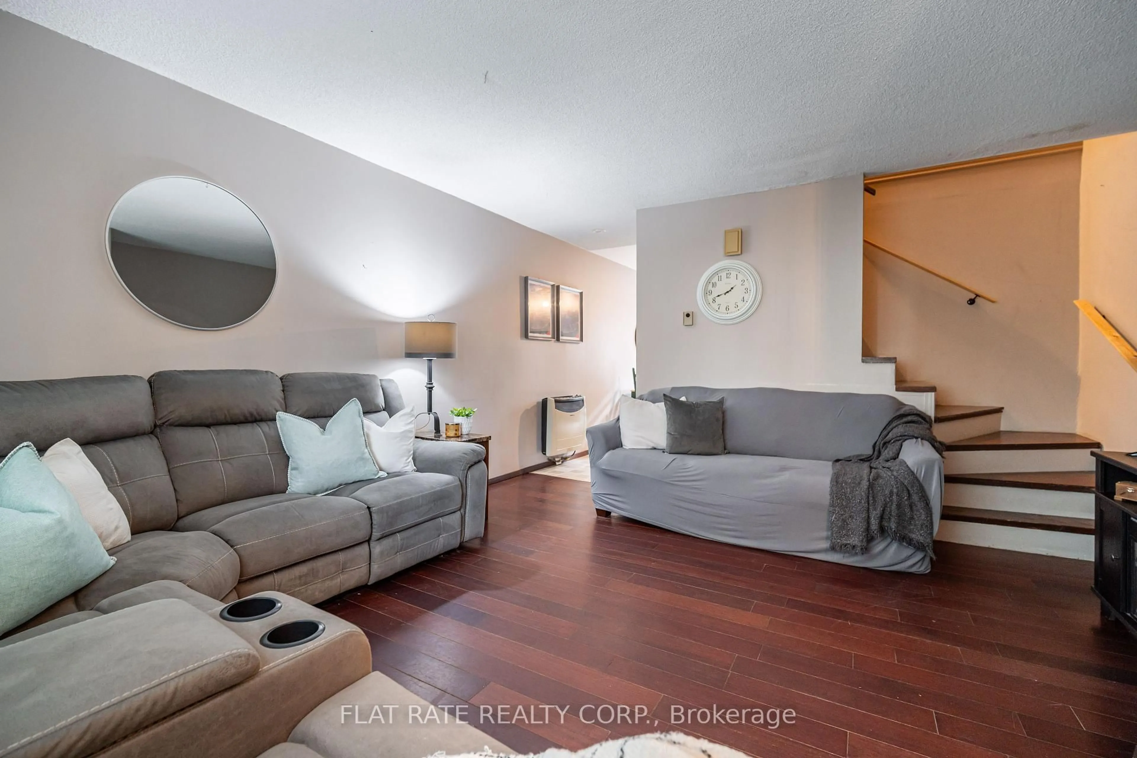 Living room with furniture, wood/laminate floor for 610 GEORGE St #12, Peterborough Central Ontario K9H 3S6