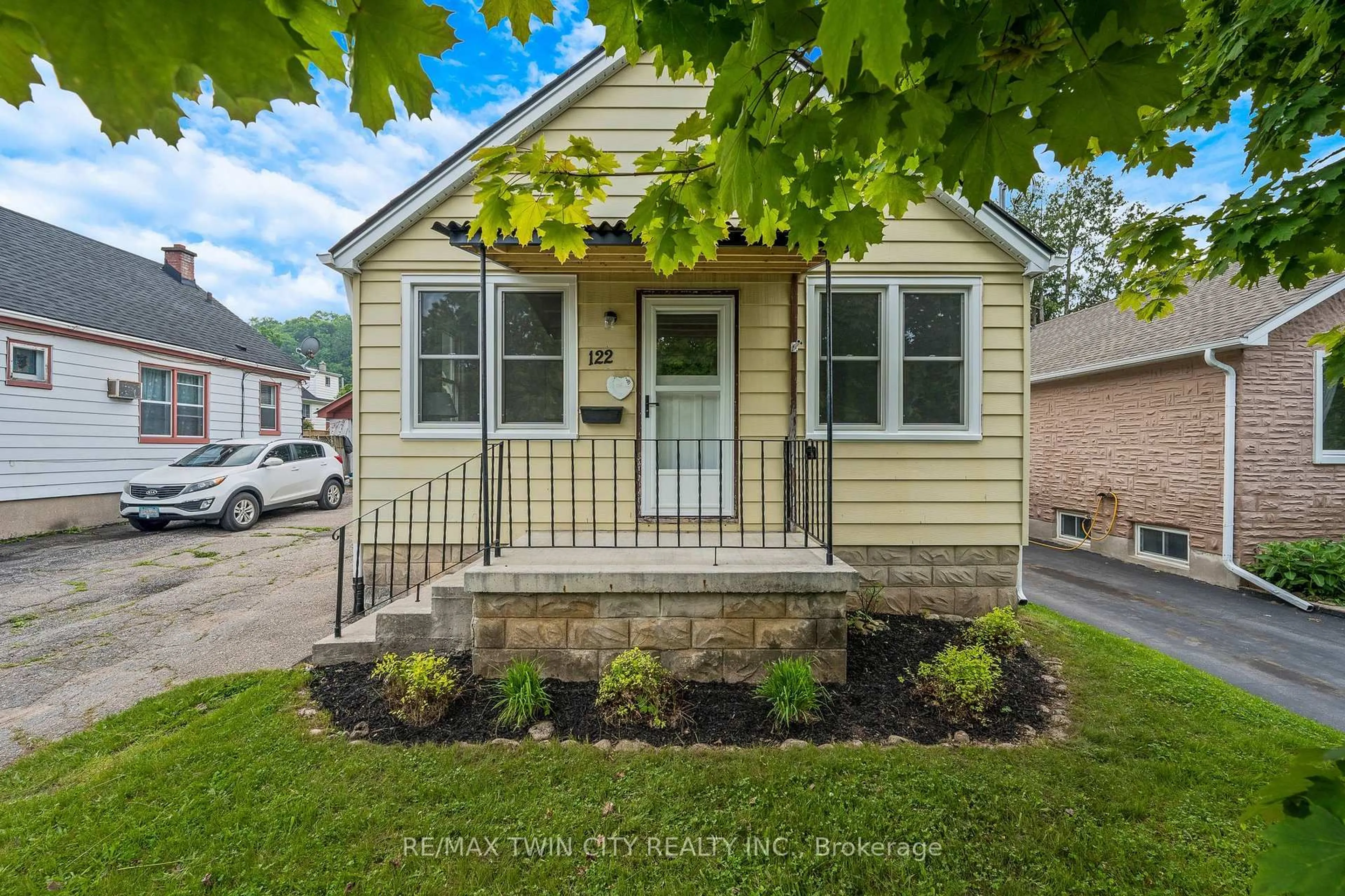 Home with vinyl exterior material, street for 122 Tait St, Cambridge Ontario N1S 3E5