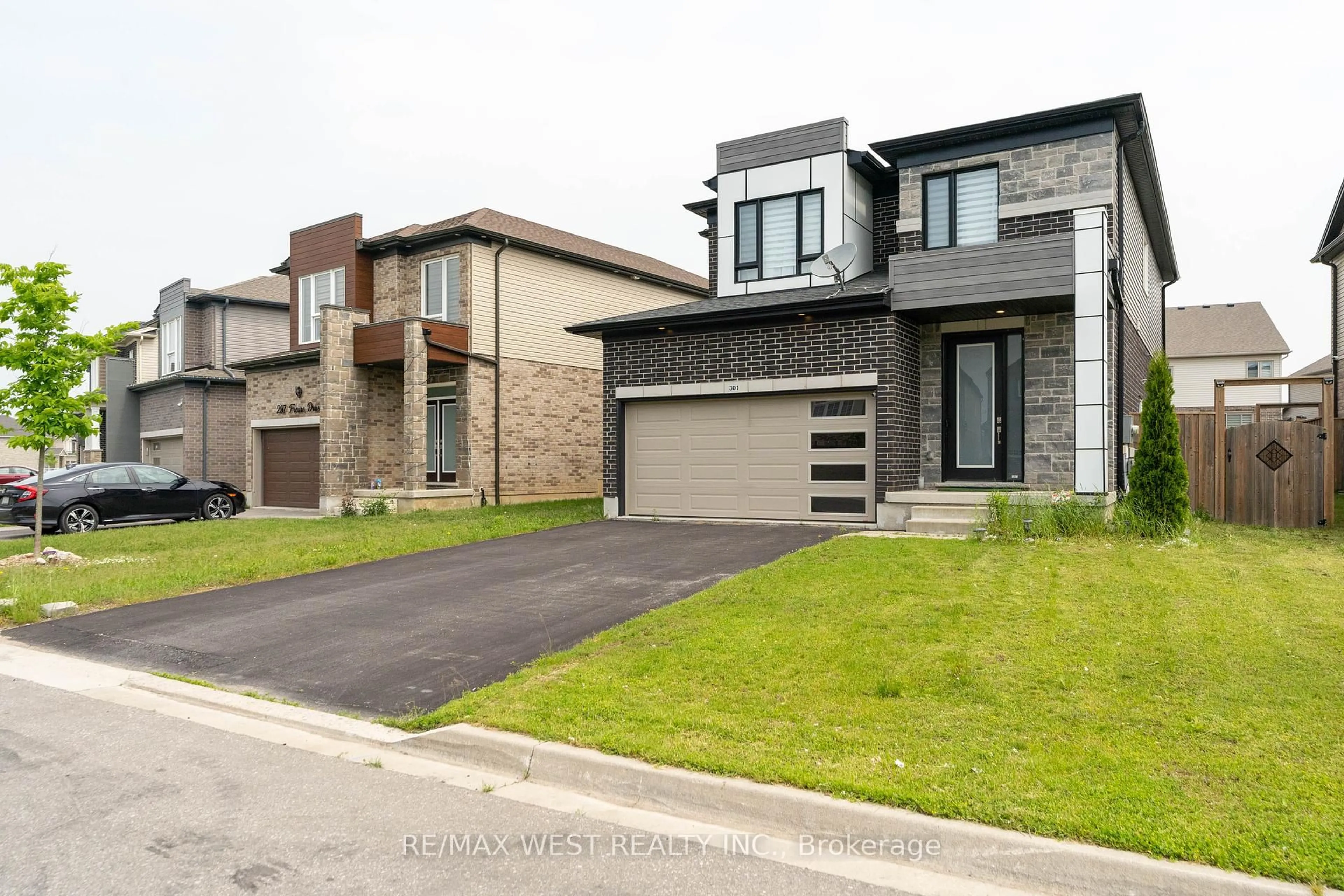 Home with brick exterior material, street for 301 Freure Dr, Cambridge Ontario N1S 0B5