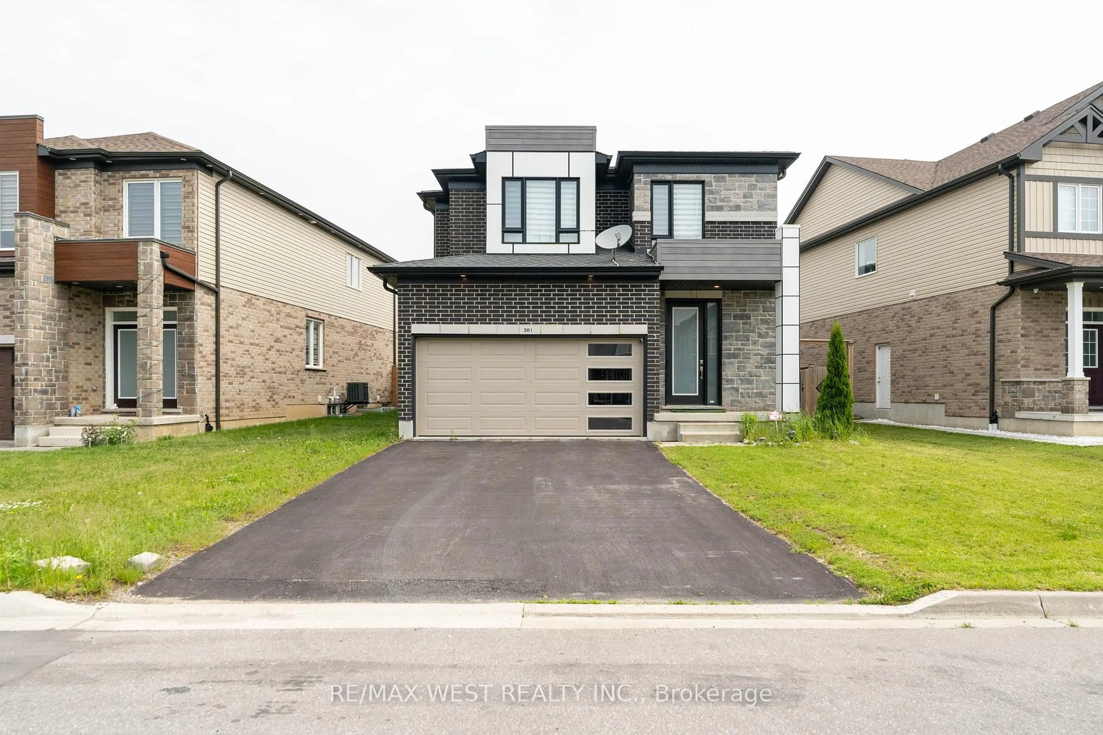 Home with brick exterior material, street for 301 Freure Dr, Cambridge Ontario N1S 0B5