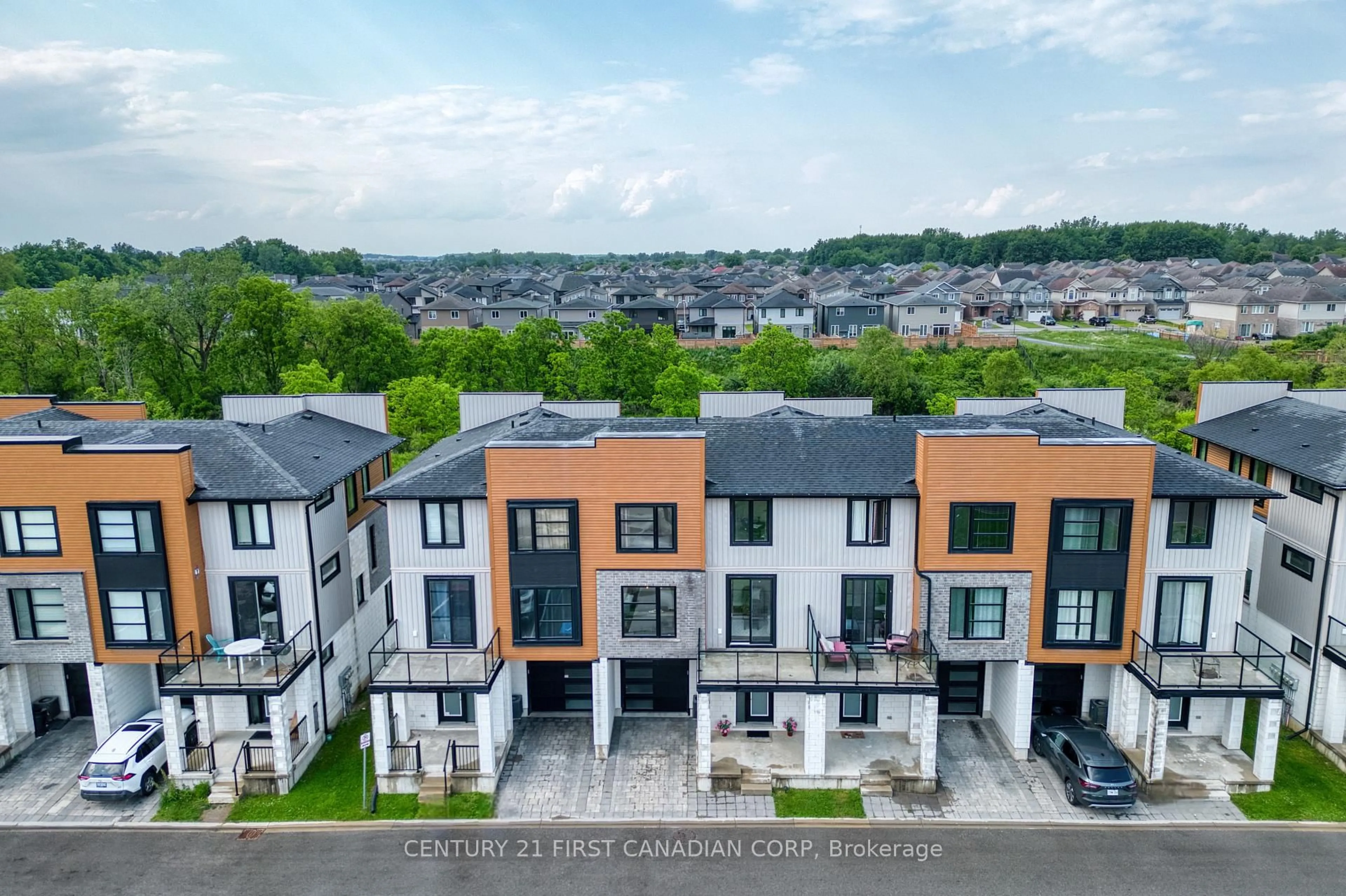 A pic from outside/outdoor area/front of a property/back of a property/a pic from drone, unknown for 946 West Village Sq, London North Ontario N6H 0J7