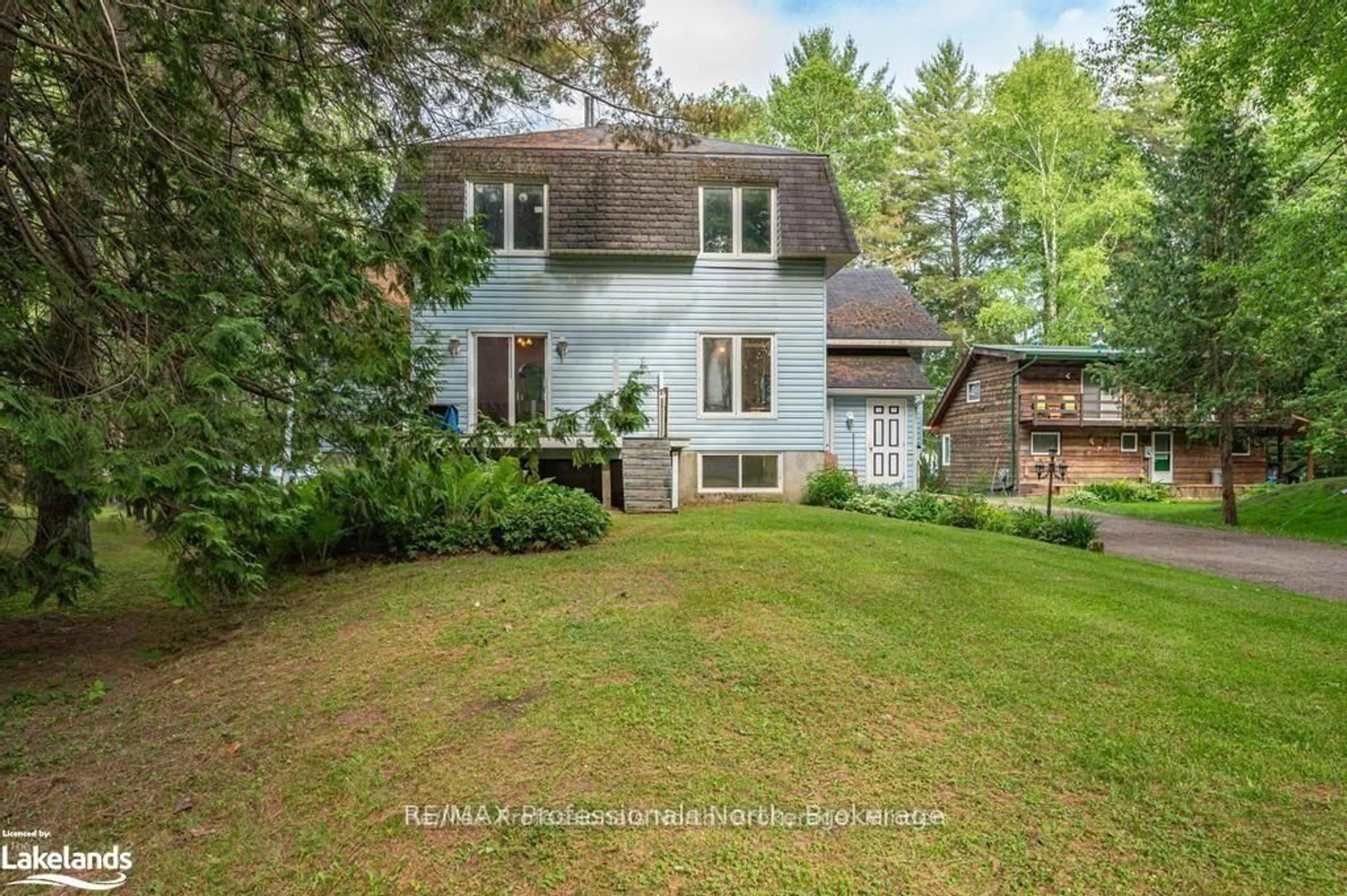 A pic from outside/outdoor area/front of a property/back of a property/a pic from drone, unknown for 1015 Blackberry Lane, Minden Hills Ontario K0M 2K0