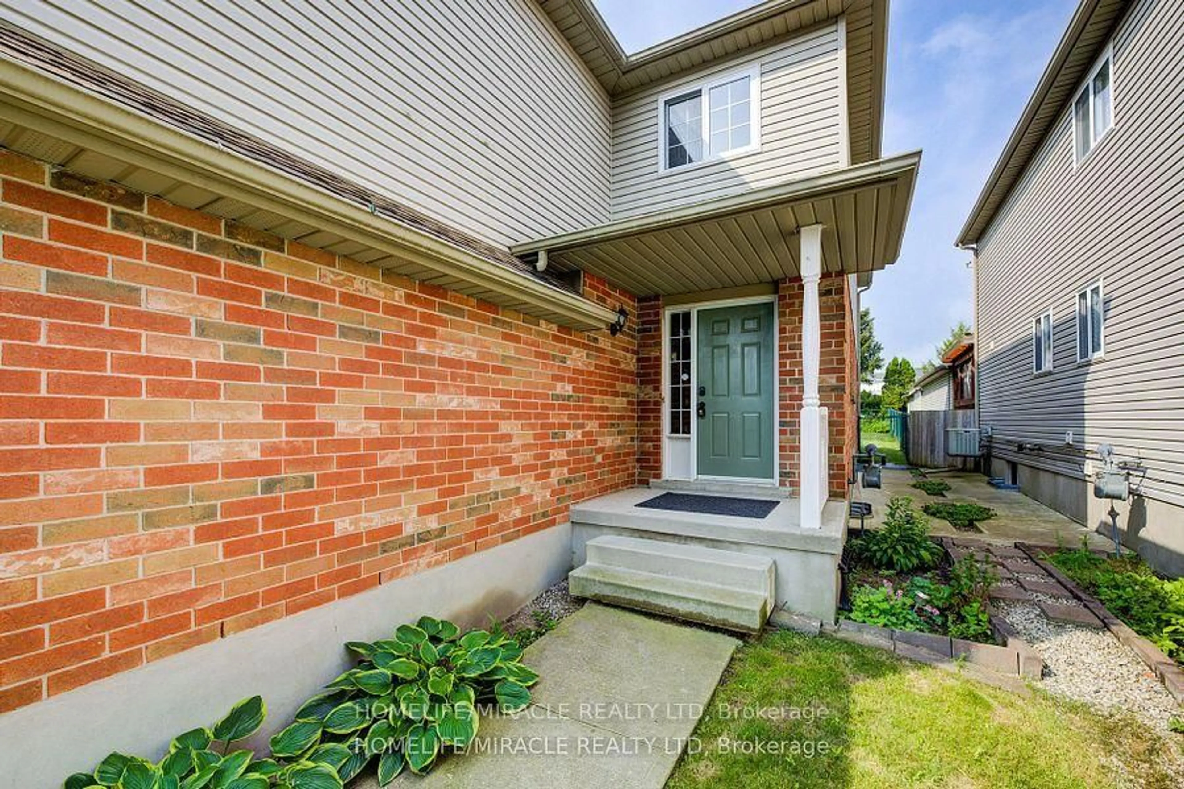 Home with brick exterior material, street for 6 Resurrection Dr, Kitchener Ontario N2N 3C1