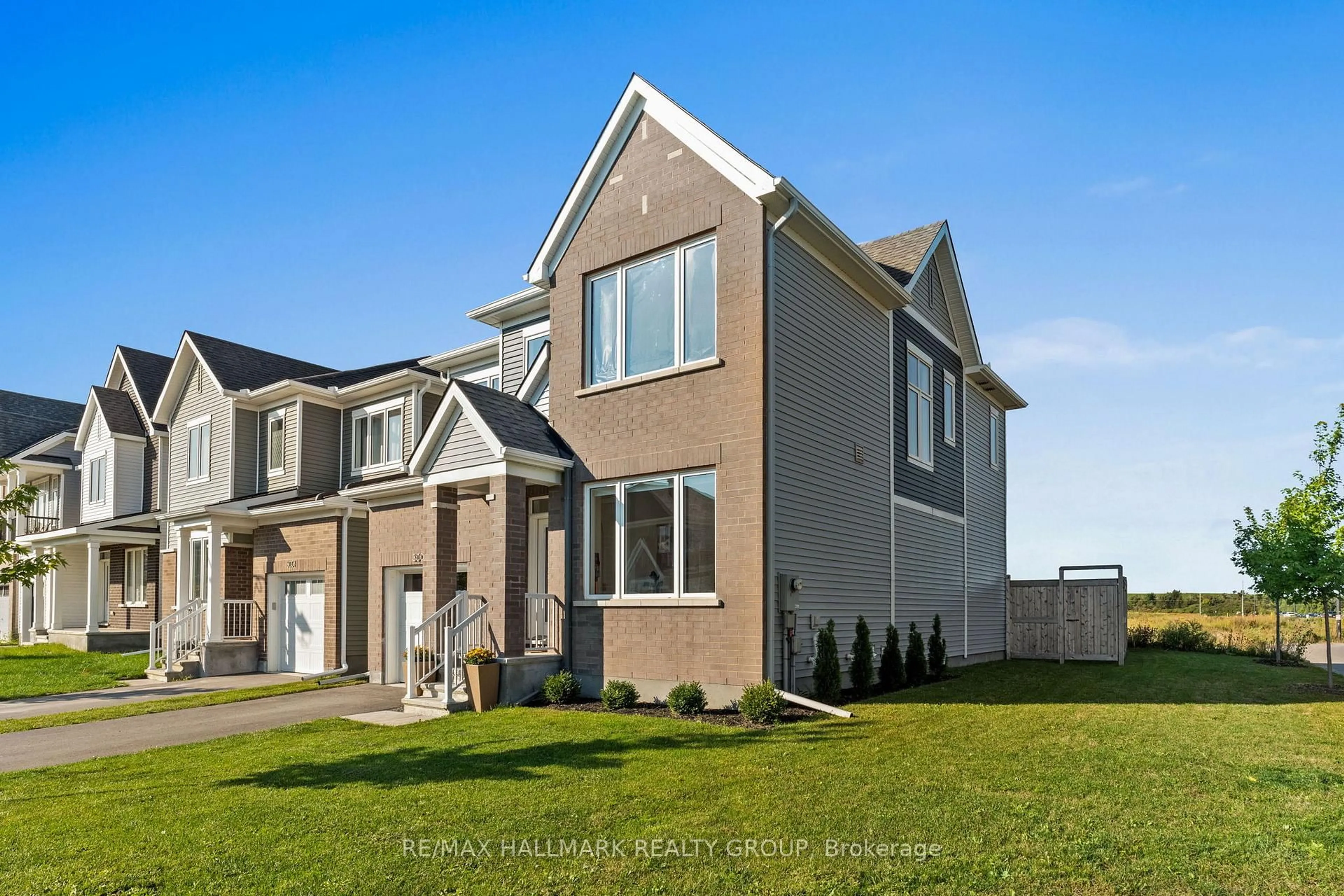 Home with vinyl exterior material, street for 3000 Travertine Way, Ottawa Ontario K2J 6W5