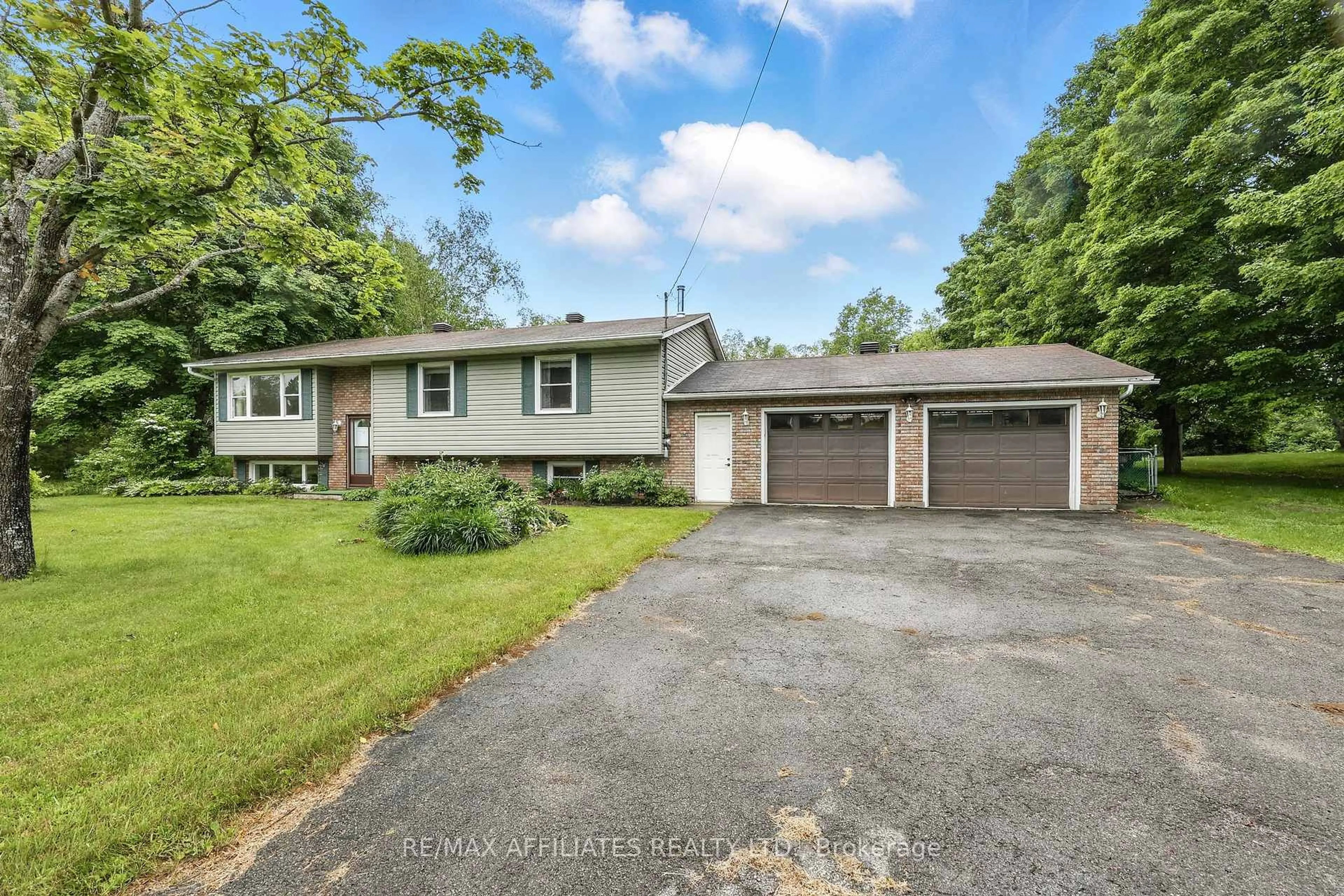 A pic from outside/outdoor area/front of a property/back of a property/a pic from drone, street for 657 Harper Rd, Perth Ontario K7H 3C9