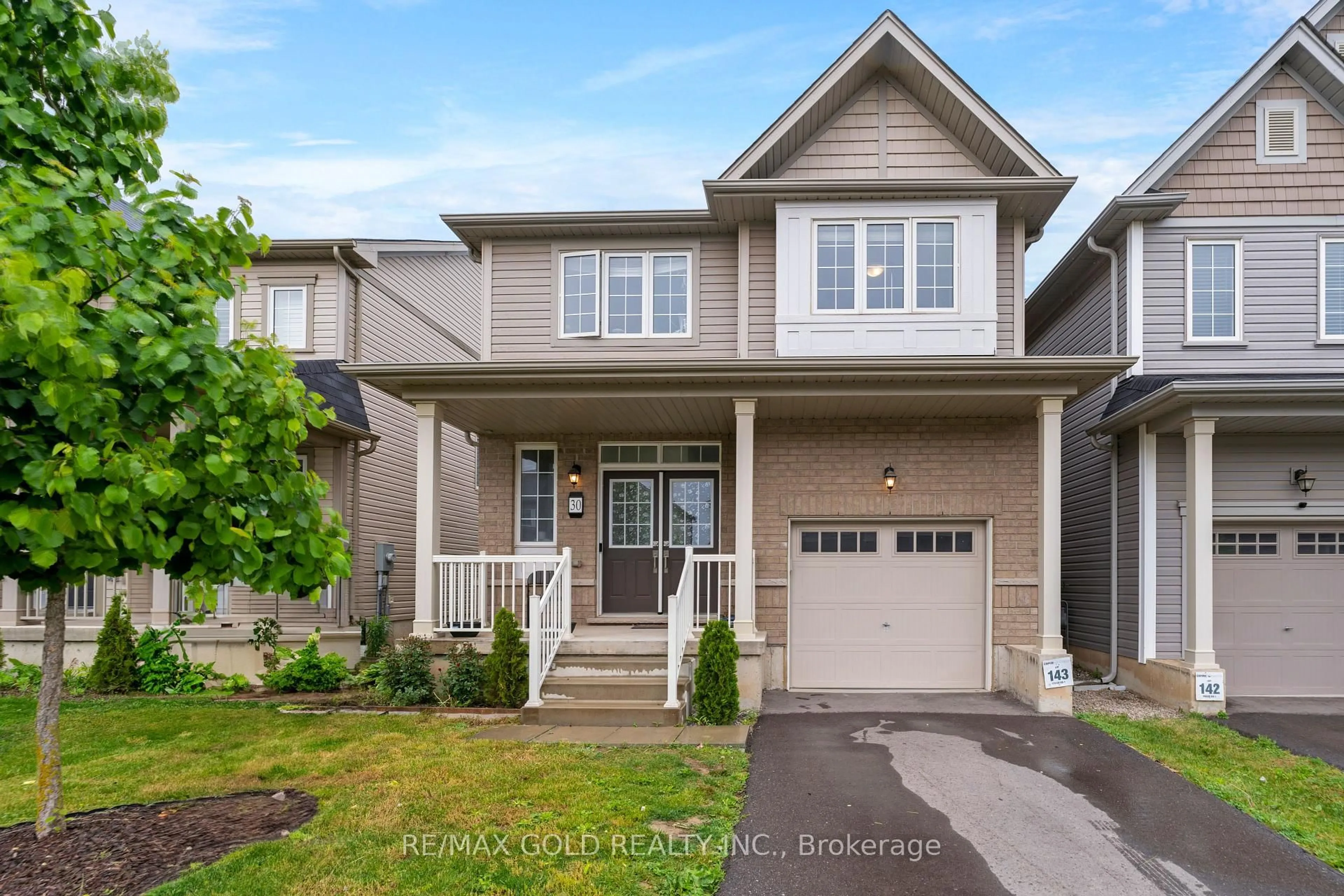 Home with vinyl exterior material, street for 30 Cooke Ave, Brantford Ontario N3T 0S1