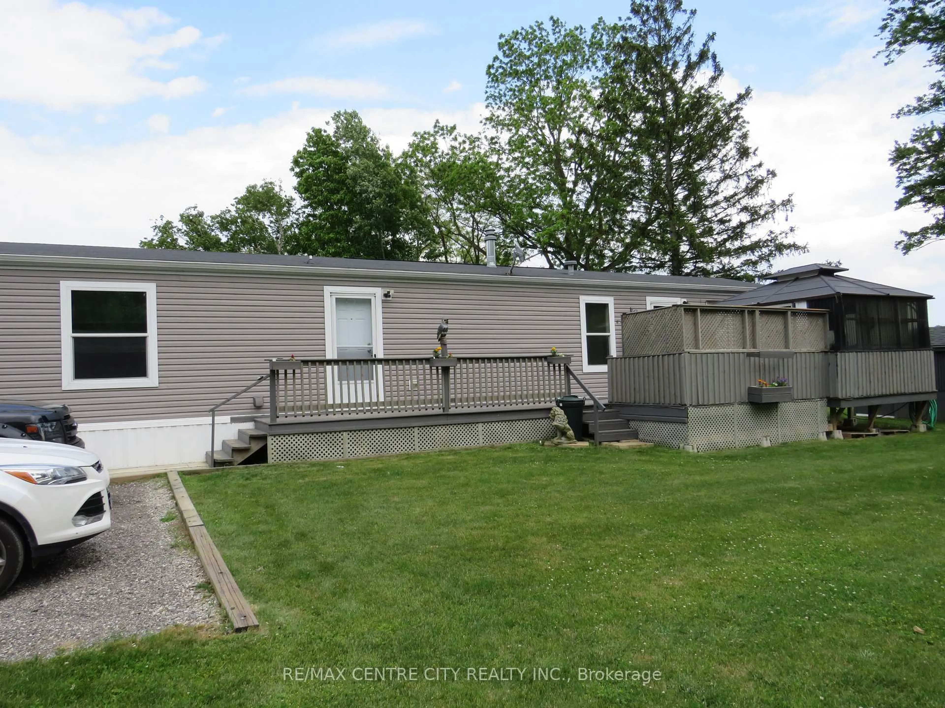 Home with vinyl exterior material, street for 15895 Longwoods Rd #106, Chatham-Kent Ontario N0P 1C0