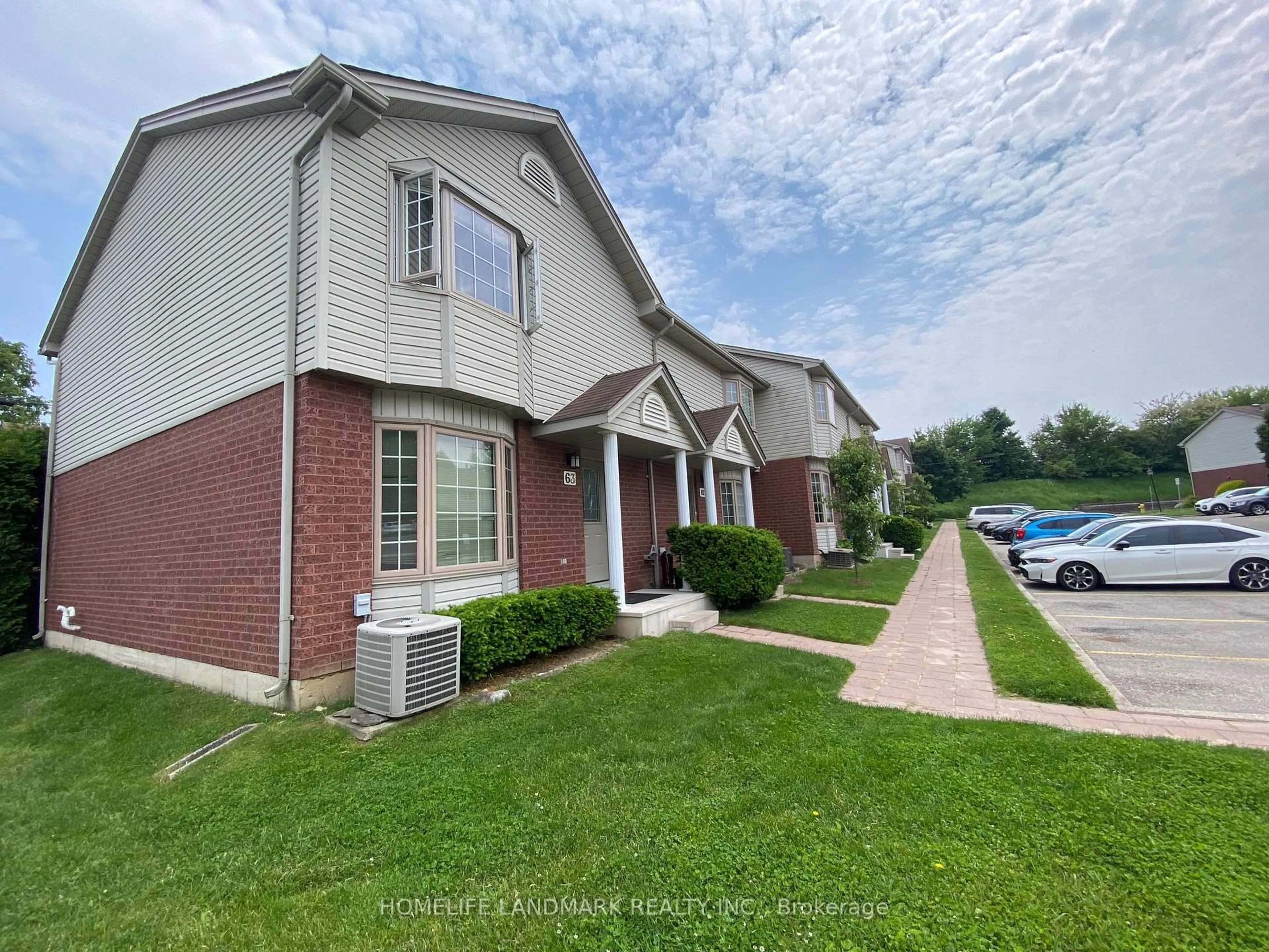 A pic from outside/outdoor area/front of a property/back of a property/a pic from drone, street for 70 CHAPMAN Crt #63, London North Ontario N6G 4Z9