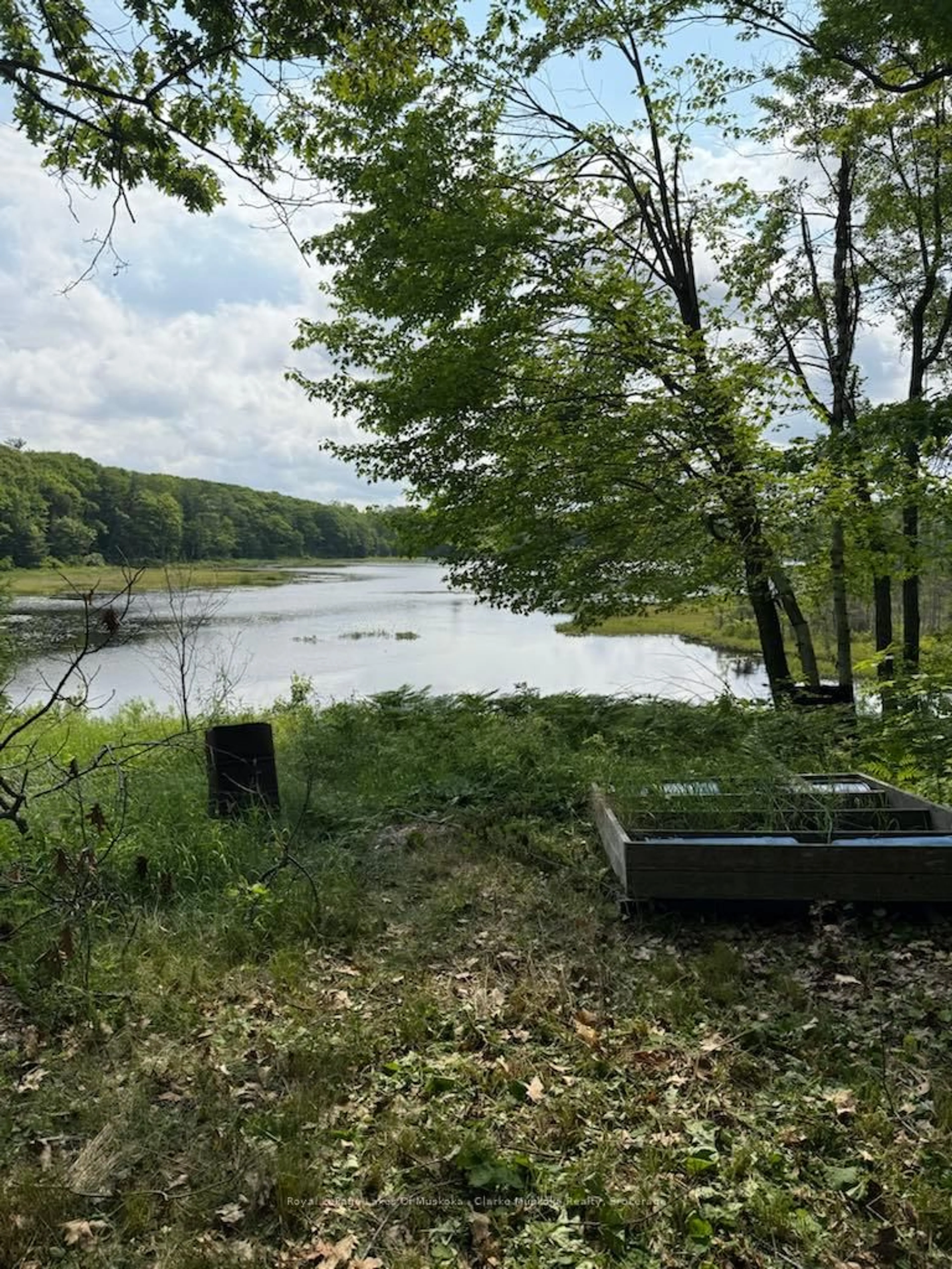 A pic from outside/outdoor area/front of a property/back of a property/a pic from drone, water/lake/river/ocean view for 173 612 Highway, Seguin Ontario P0C 1H0