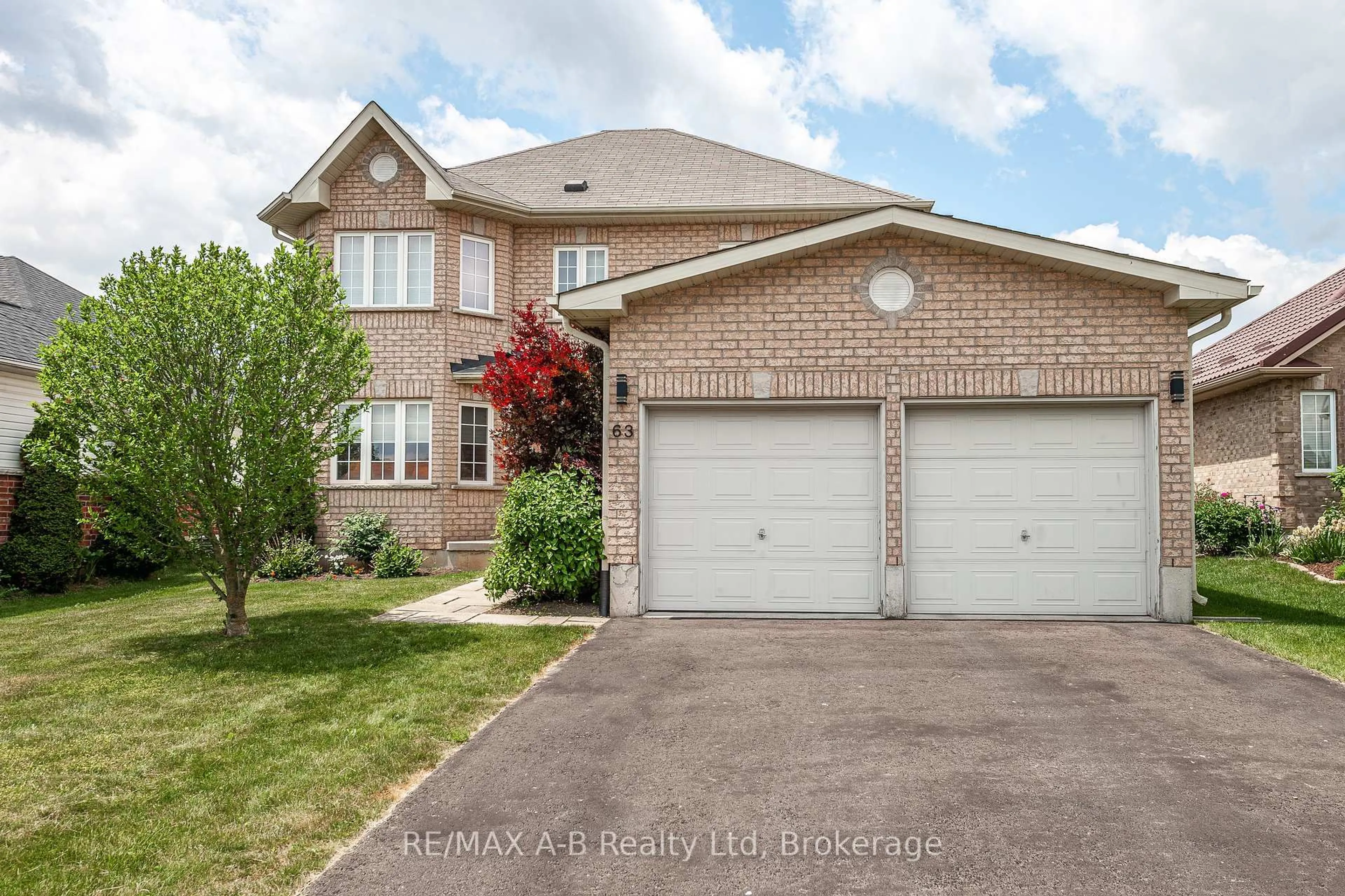 Home with brick exterior material, street for 63 Delong Dr, Norwich Ontario N0J 1P0