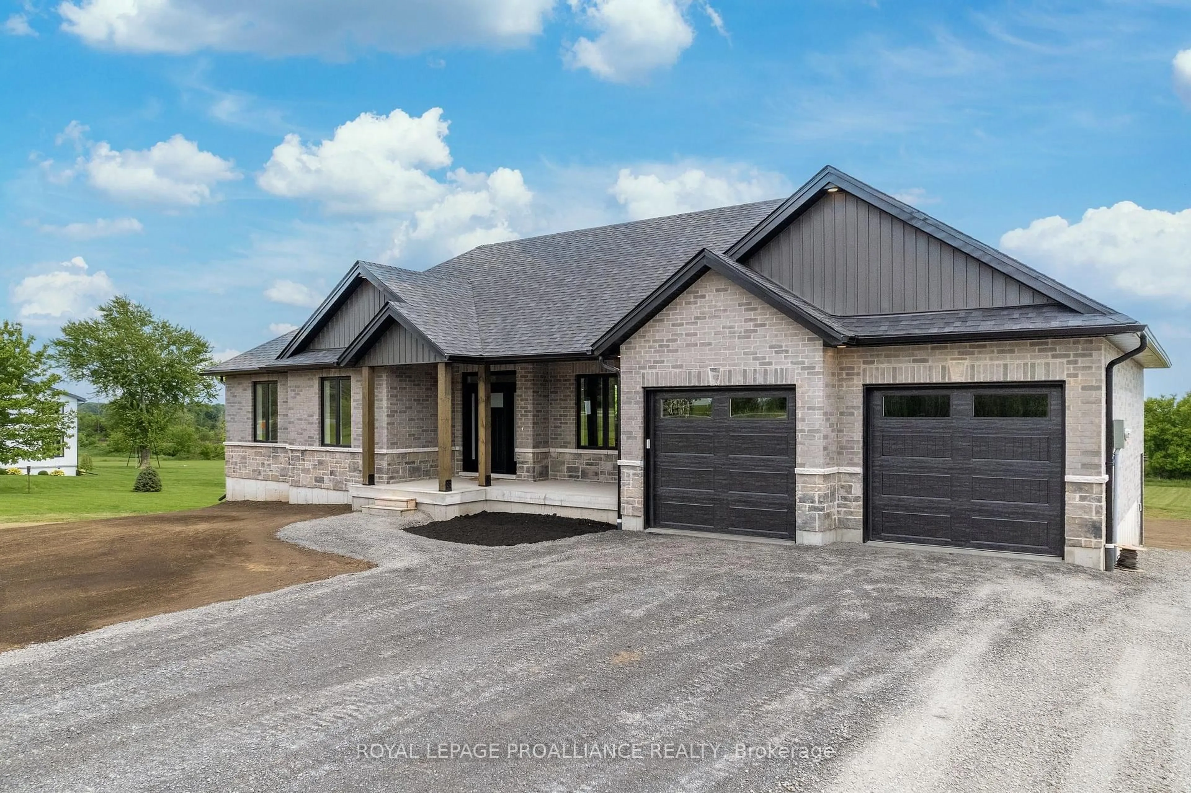 Home with brick exterior material, street for 15603 County 2 Rd, Brighton Ontario K0K 1H0