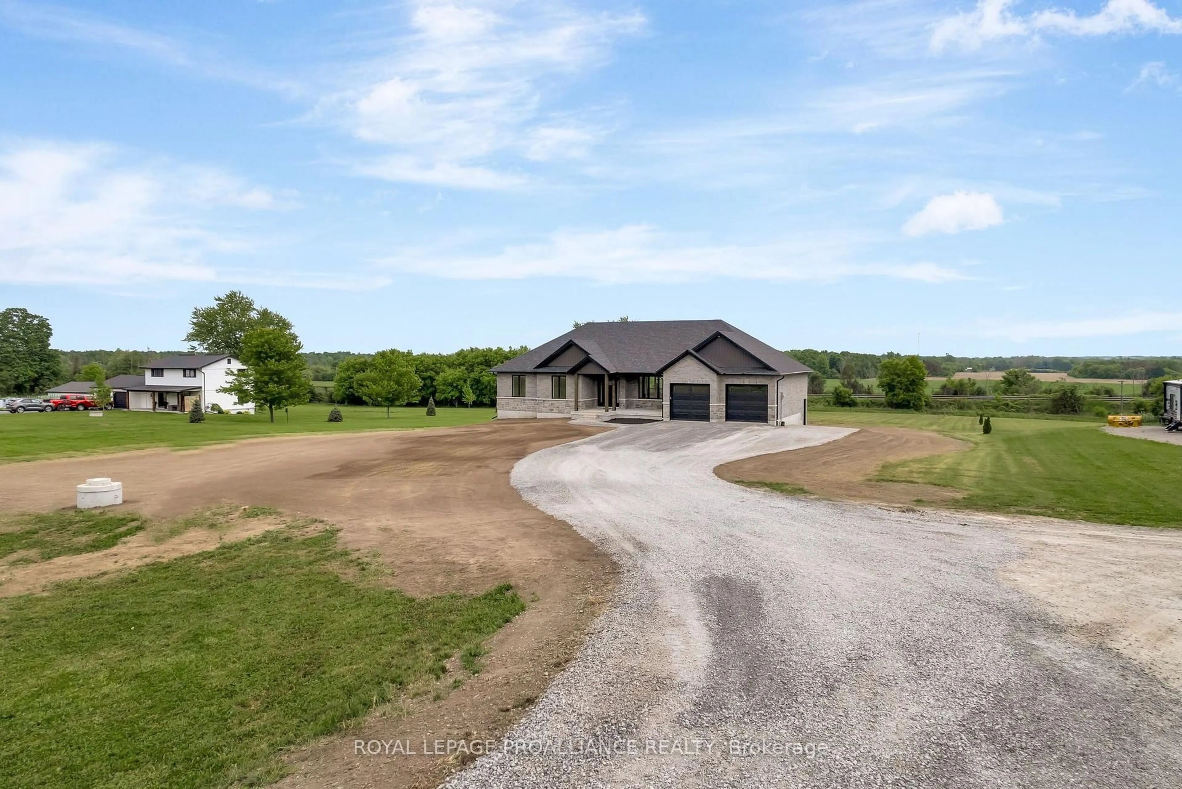 A pic from outside/outdoor area/front of a property/back of a property/a pic from drone, street for 15603 County 2 Rd, Brighton Ontario K0K 1H0