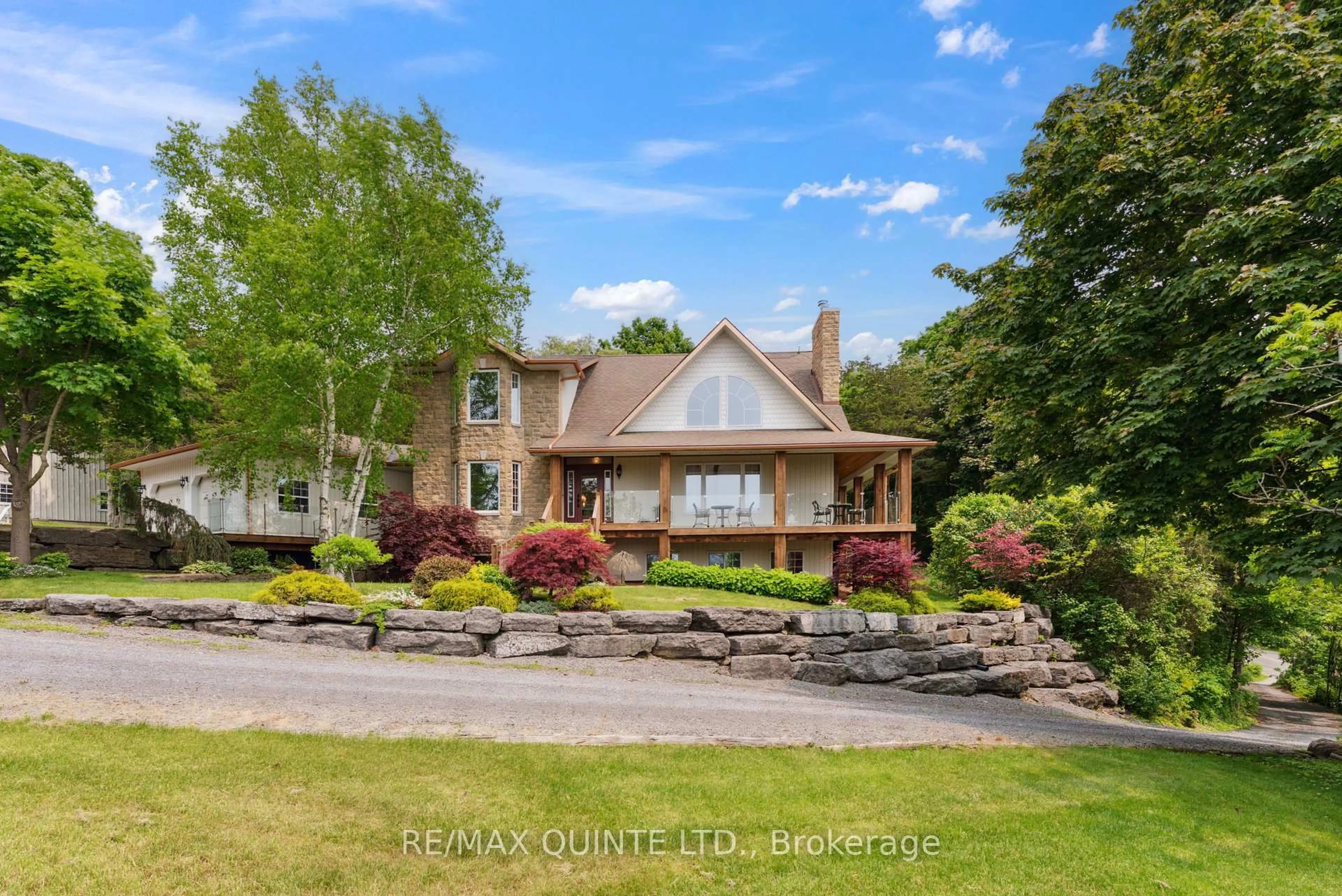A pic from outside/outdoor area/front of a property/back of a property/a pic from drone, water/lake/river/ocean view for 3225 County Road 8, Prince Edward County Ontario K0K 2T0