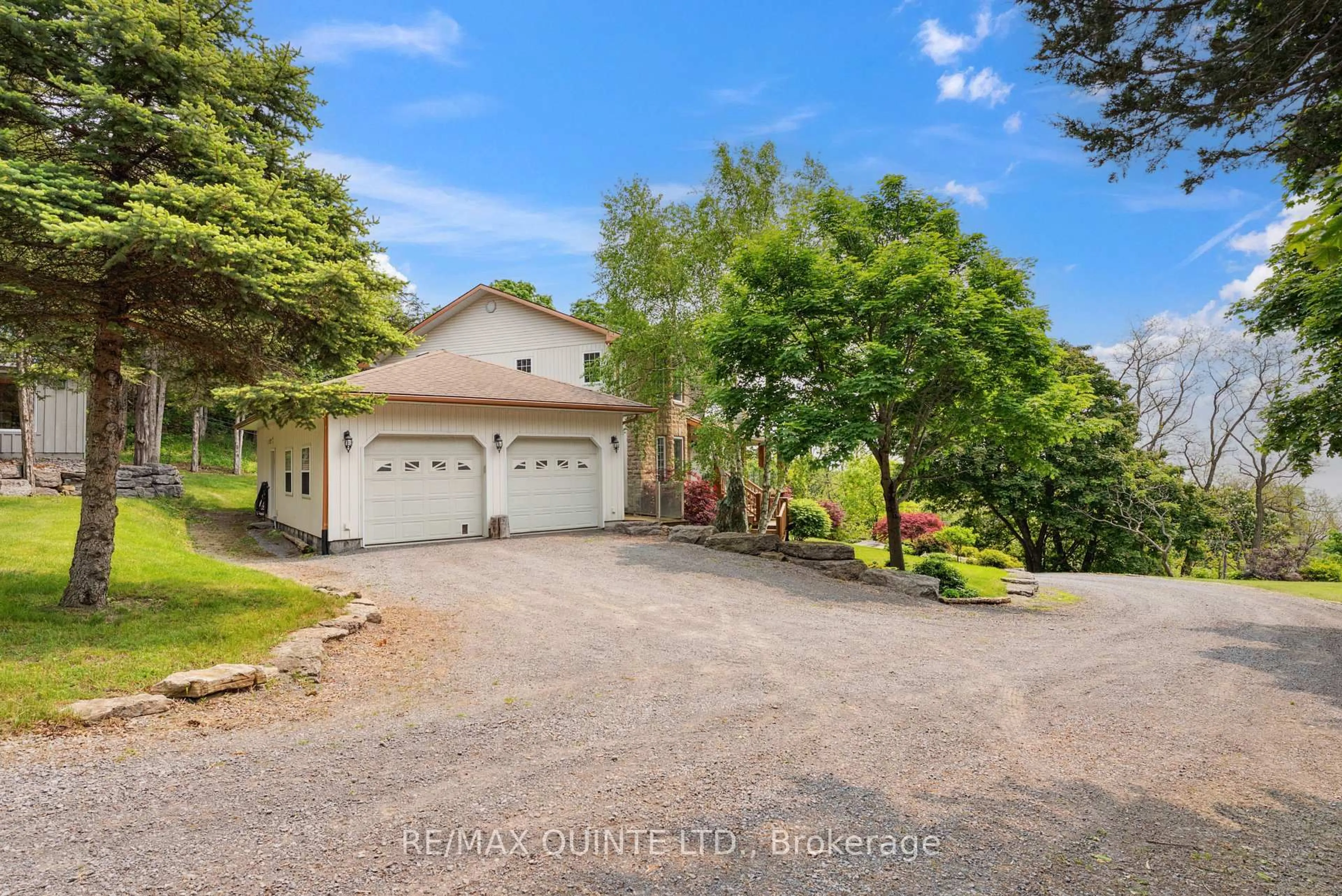 A pic from outside/outdoor area/front of a property/back of a property/a pic from drone, water/lake/river/ocean view for 3225 County Road 8, Prince Edward County Ontario K0K 2T0