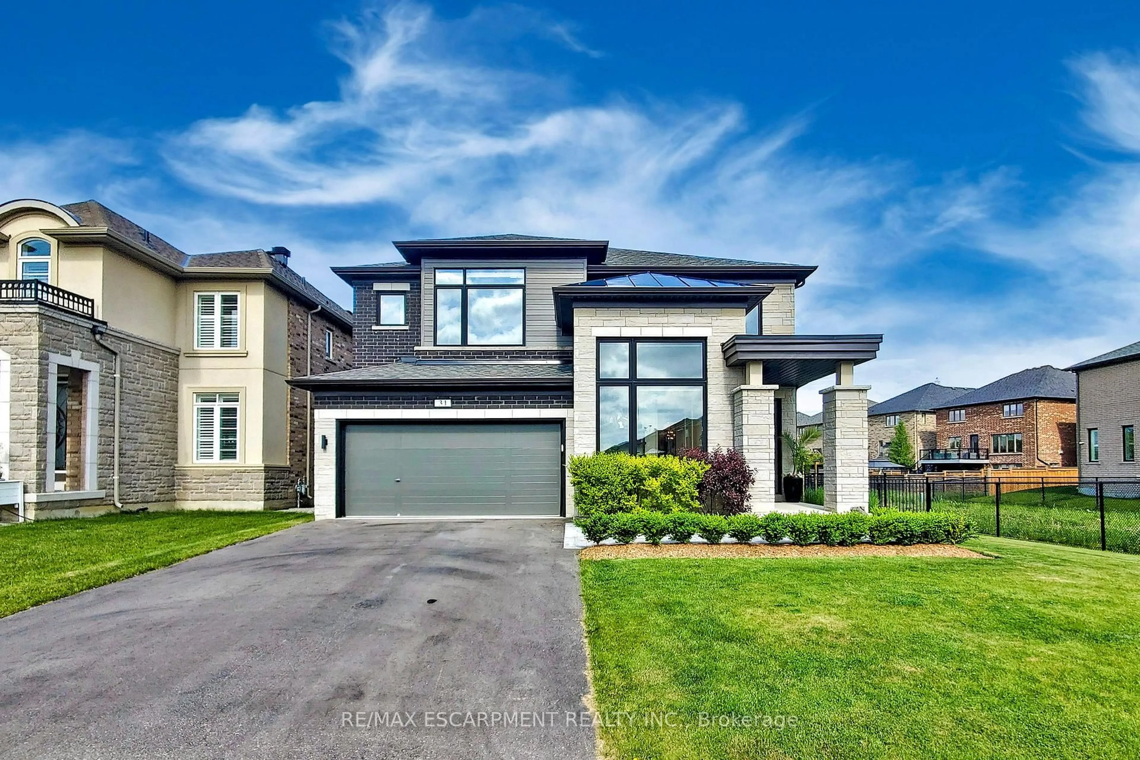 Home with brick exterior material, street for 31 Robarts Dr, Hamilton Ontario L9K 0H5