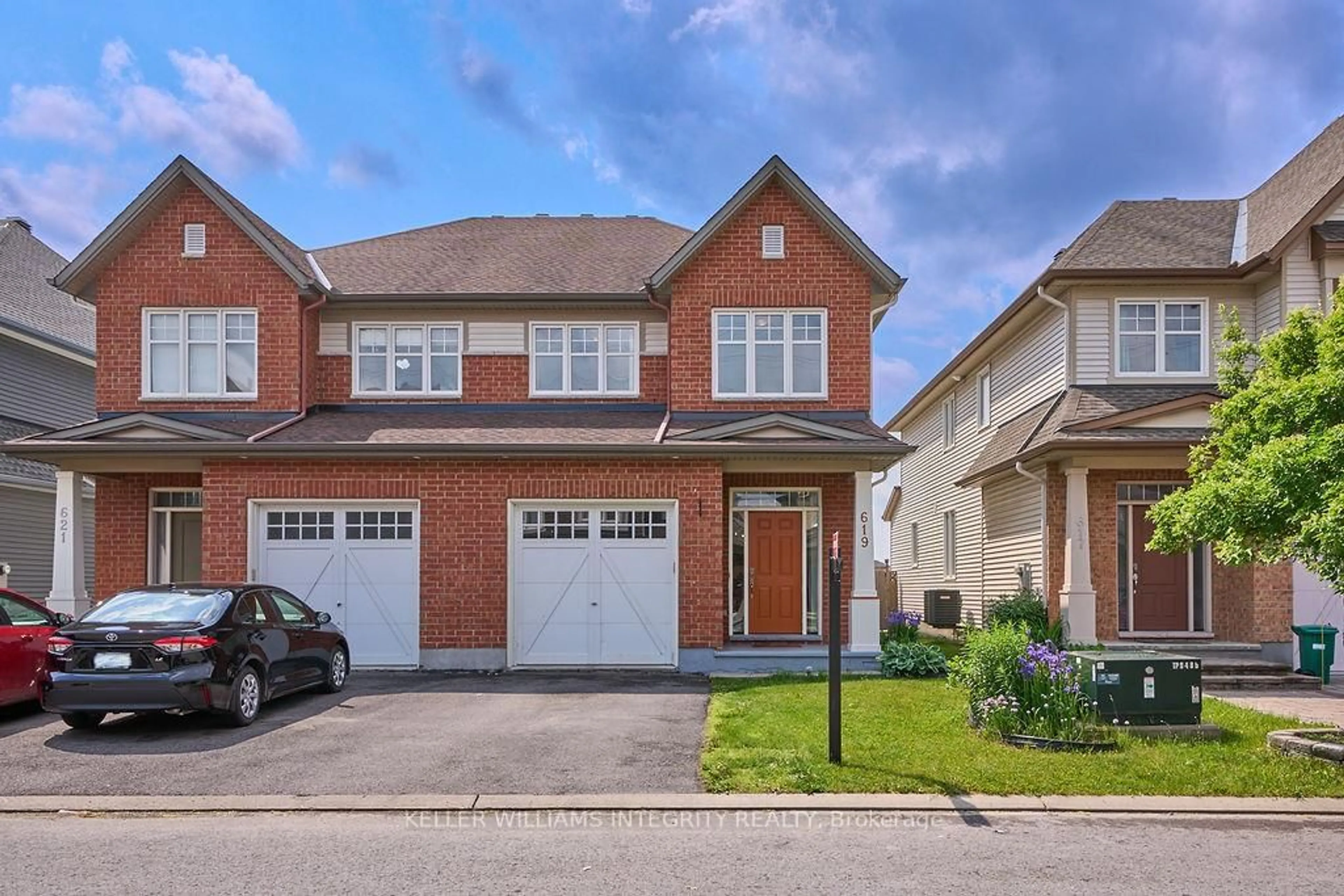 Home with brick exterior material, street for 619 Moorpark Ave, Ottawa Ontario K2M 0B6
