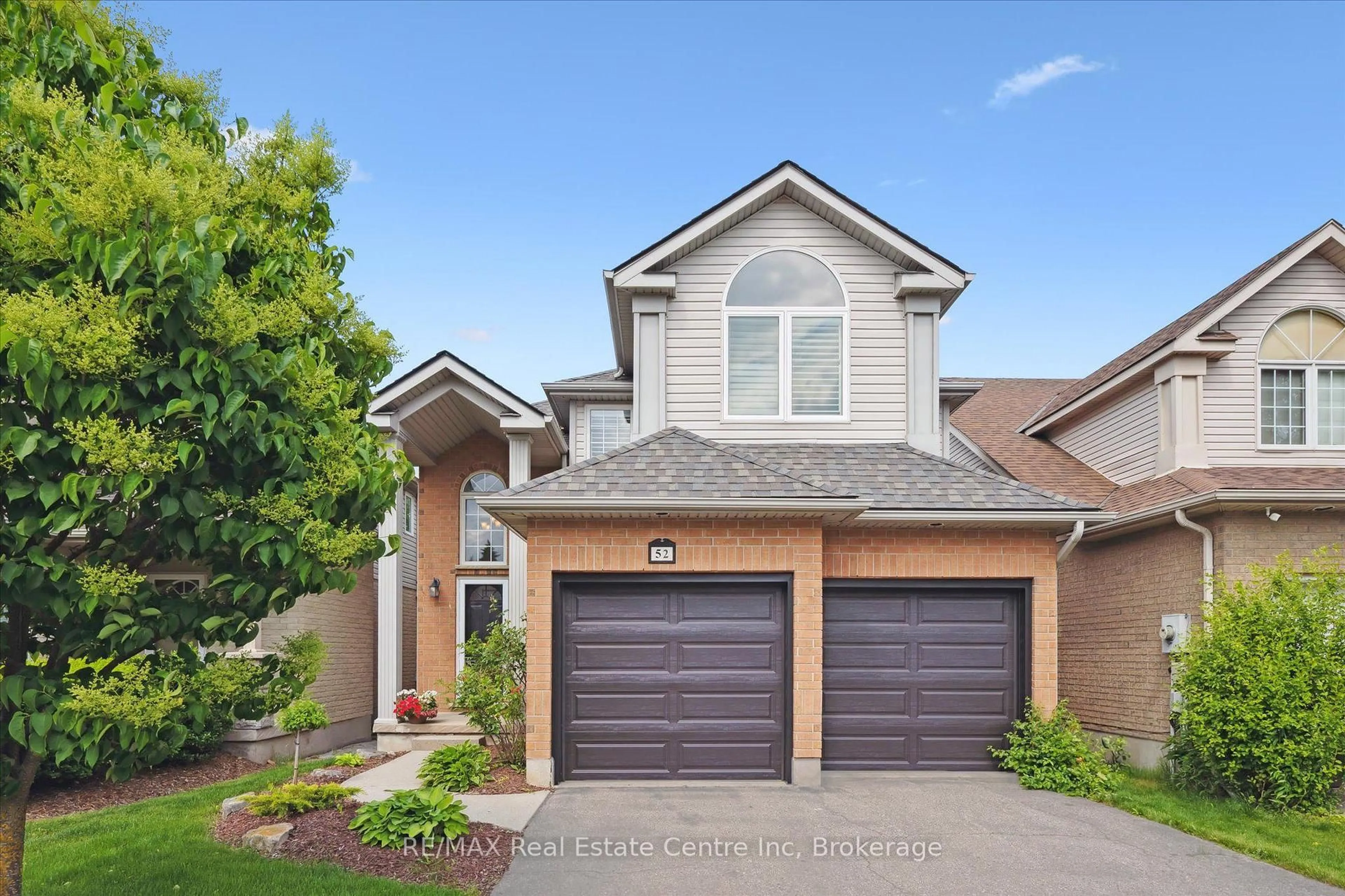 Home with brick exterior material, street for 52 CAMM Cres, Guelph Ontario N1L 1K2