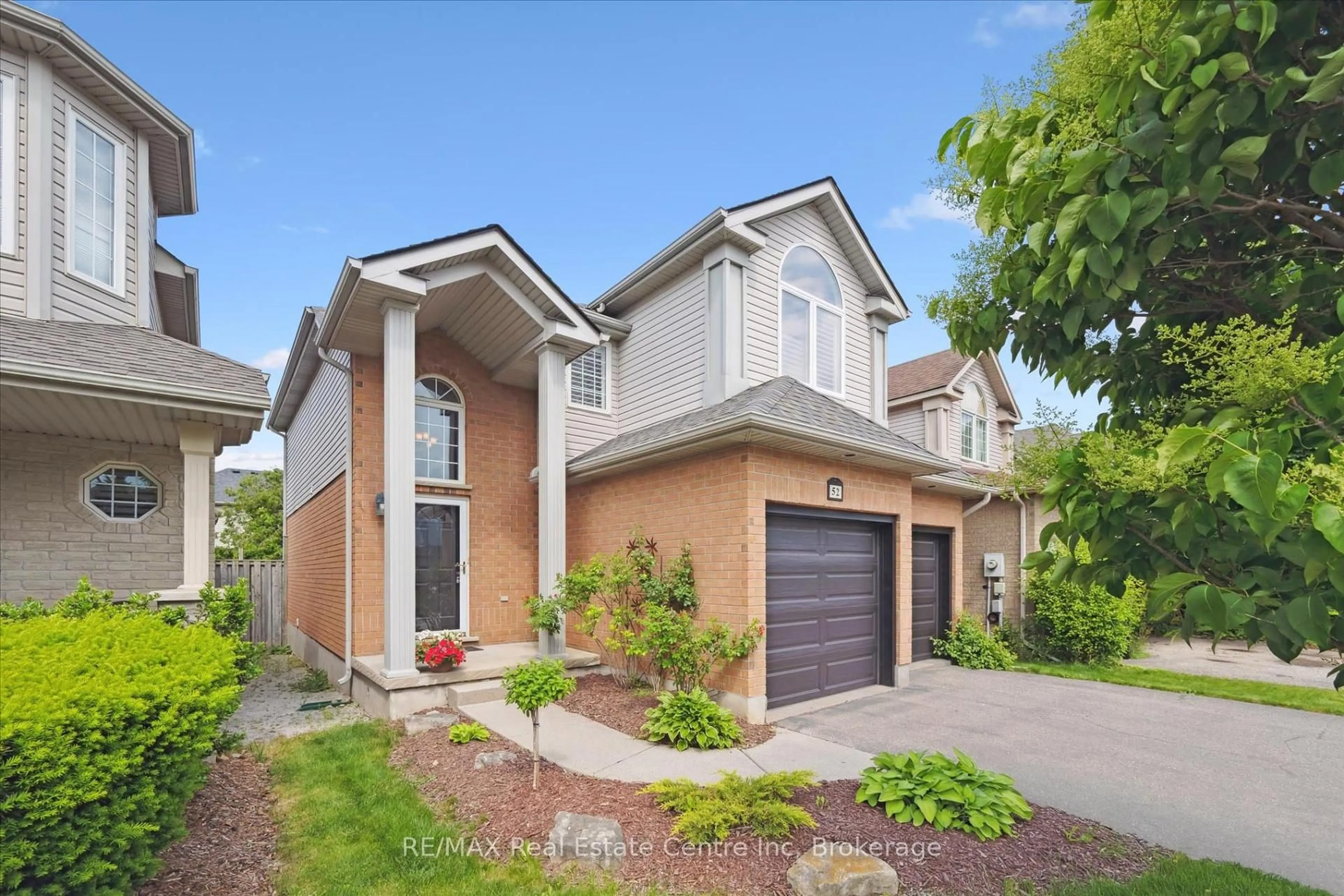 Home with brick exterior material, street for 52 CAMM Cres, Guelph Ontario N1L 1K2