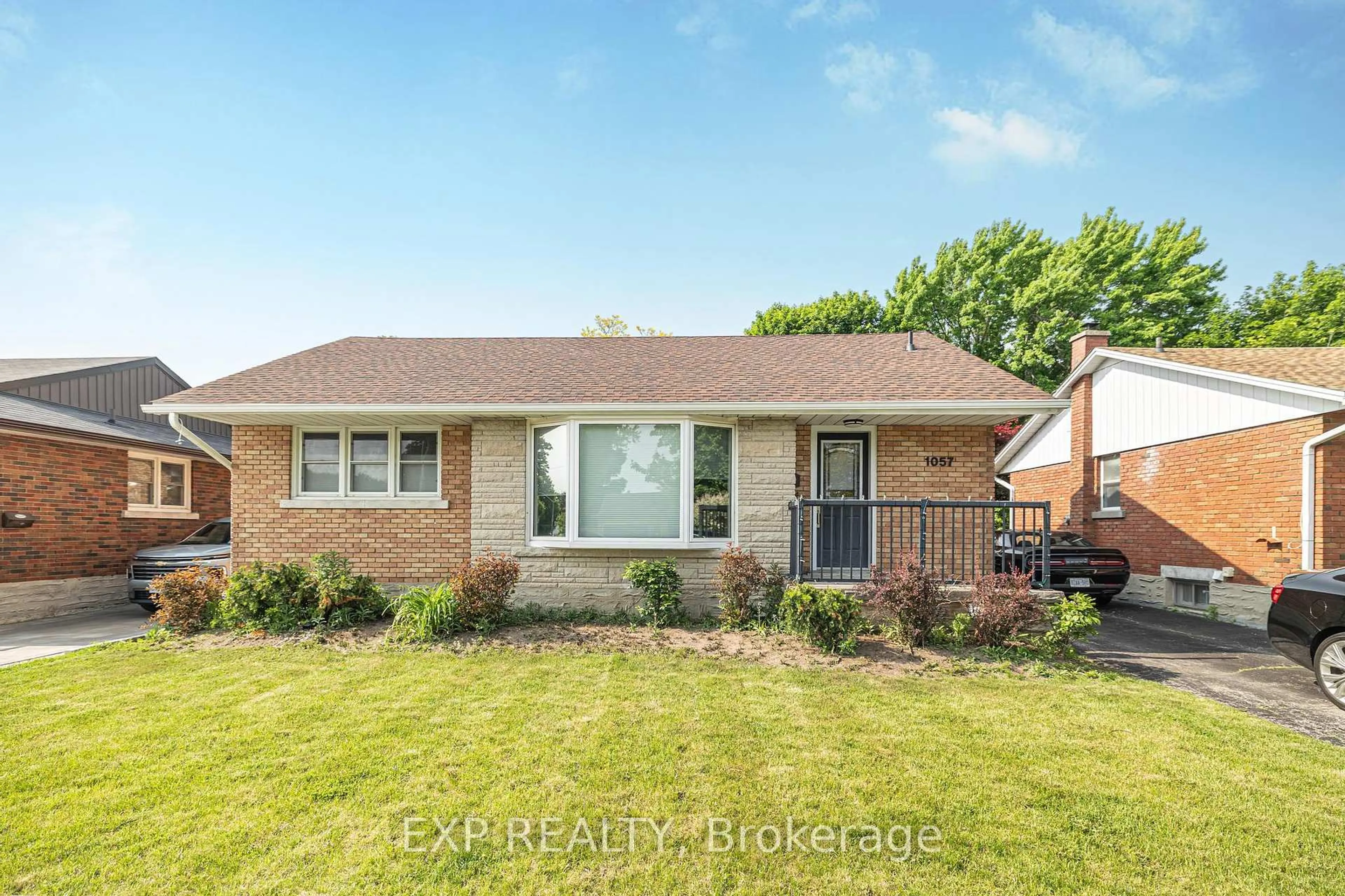 Home with brick exterior material, street for 1057 Clare Ave, Cambridge Ontario N3H 2E2