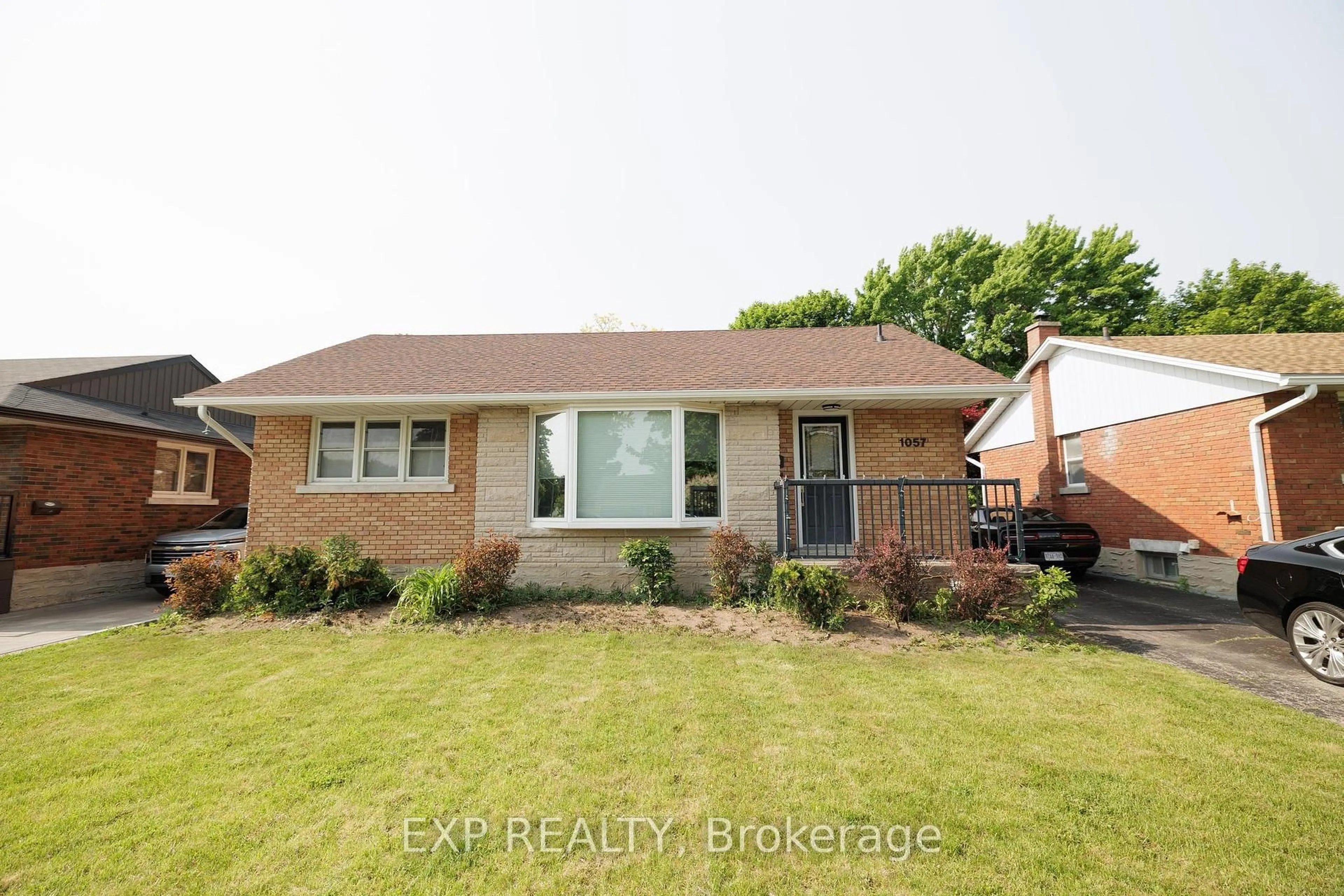 Home with brick exterior material, street for 1057 Clare Ave, Cambridge Ontario N3H 2E2