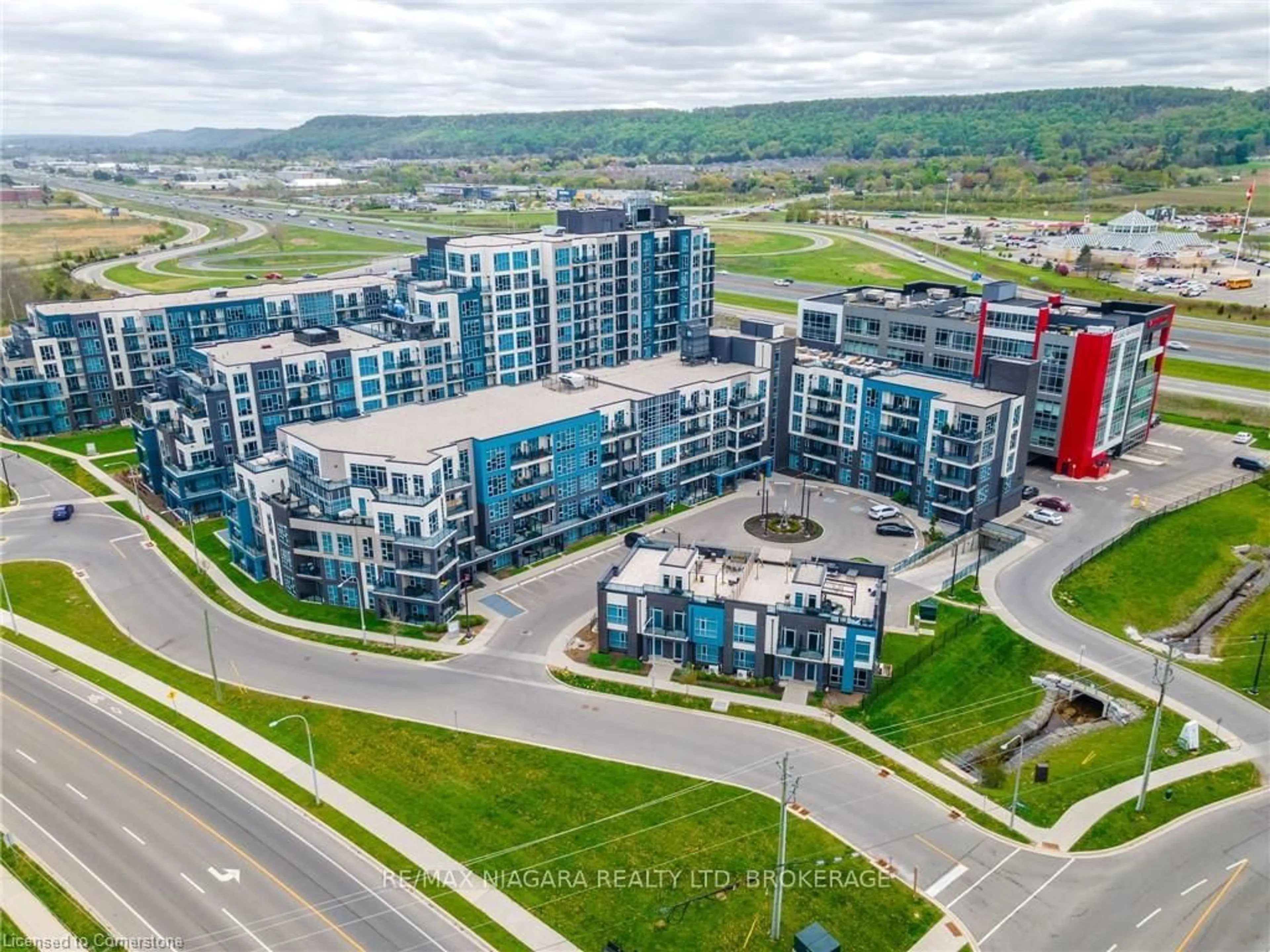 A pic from outside/outdoor area/front of a property/back of a property/a pic from drone, unknown for 10 Concord Pl #106, Grimsby Ontario L3M 0G6