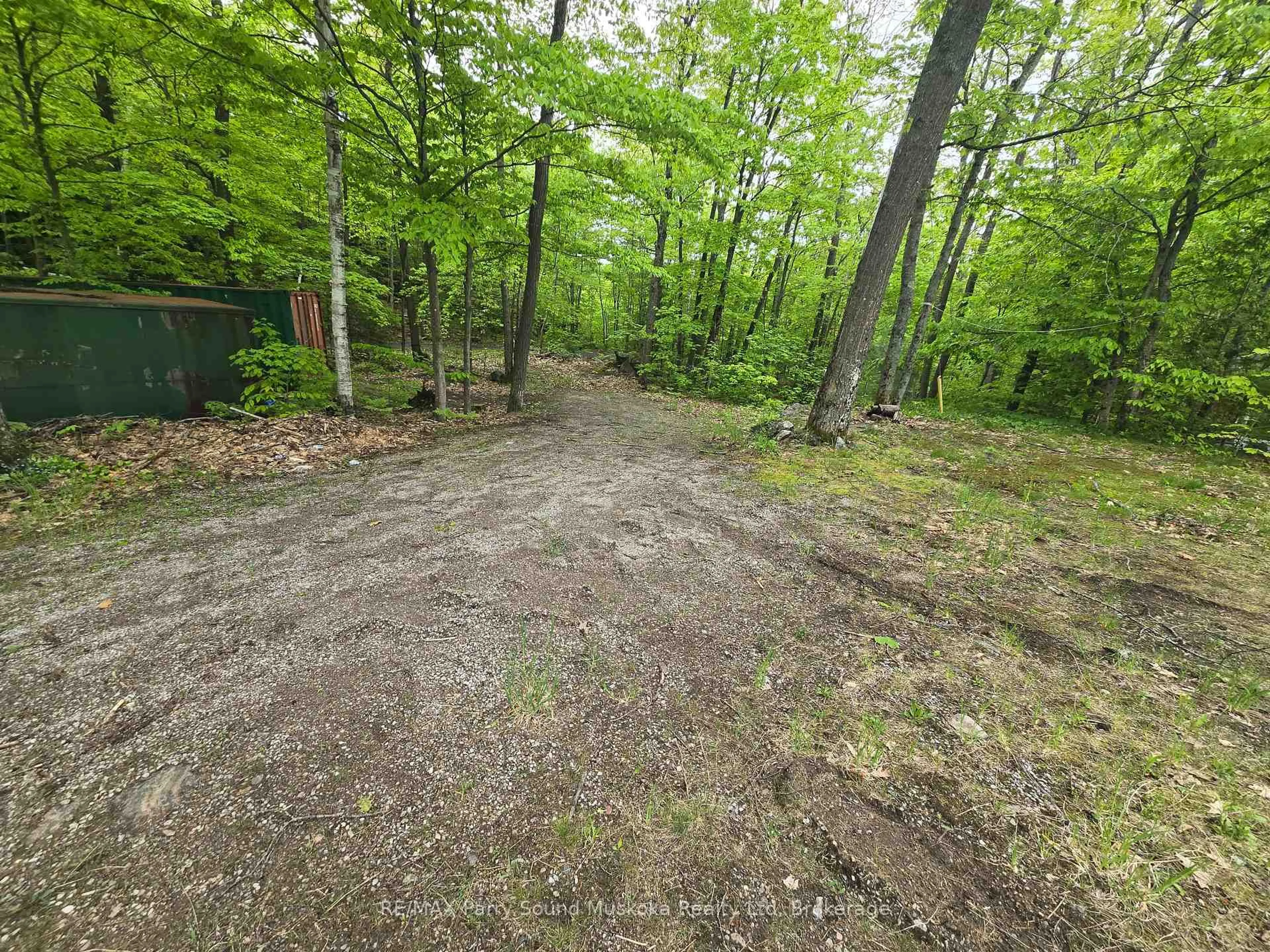 A pic from outside/outdoor area/front of a property/back of a property/a pic from drone, forest/trees view for 7 Stata Lane, Seguin Ontario P2A 2W8