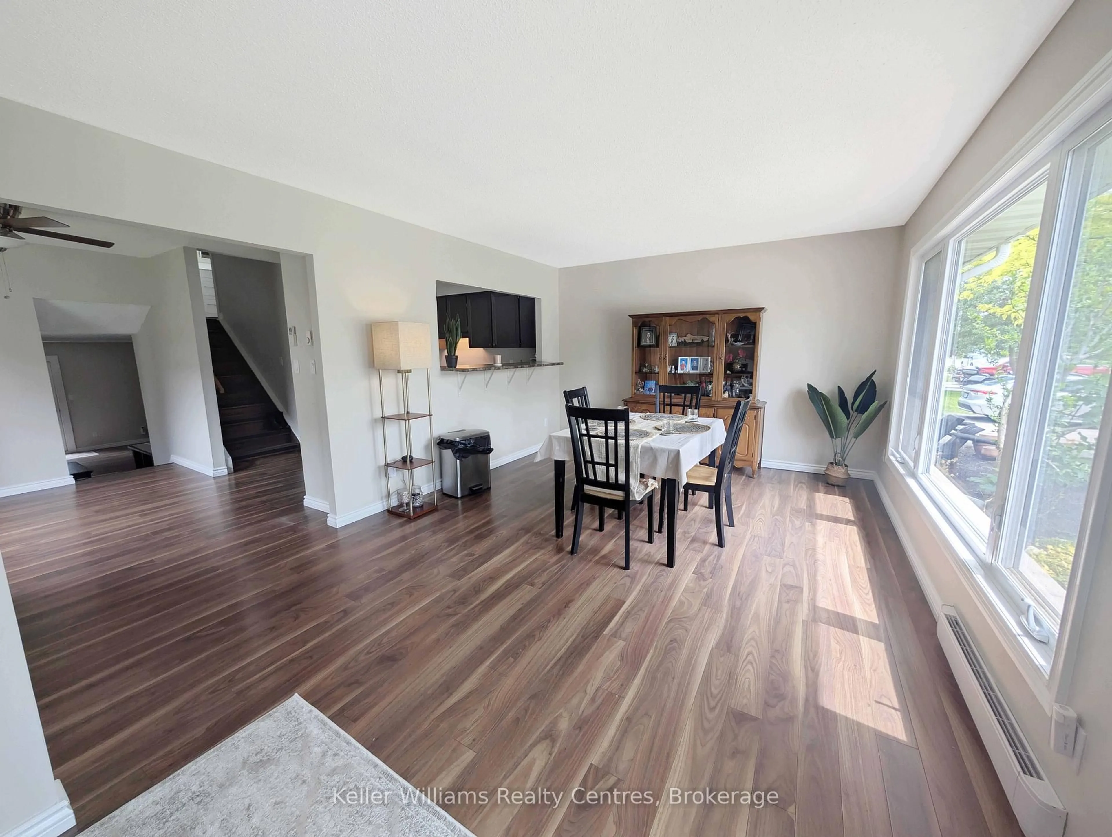 Living room with furniture, wood/laminate floor for 192 Bricker St, Saugeen Shores Ontario N0H 2C1