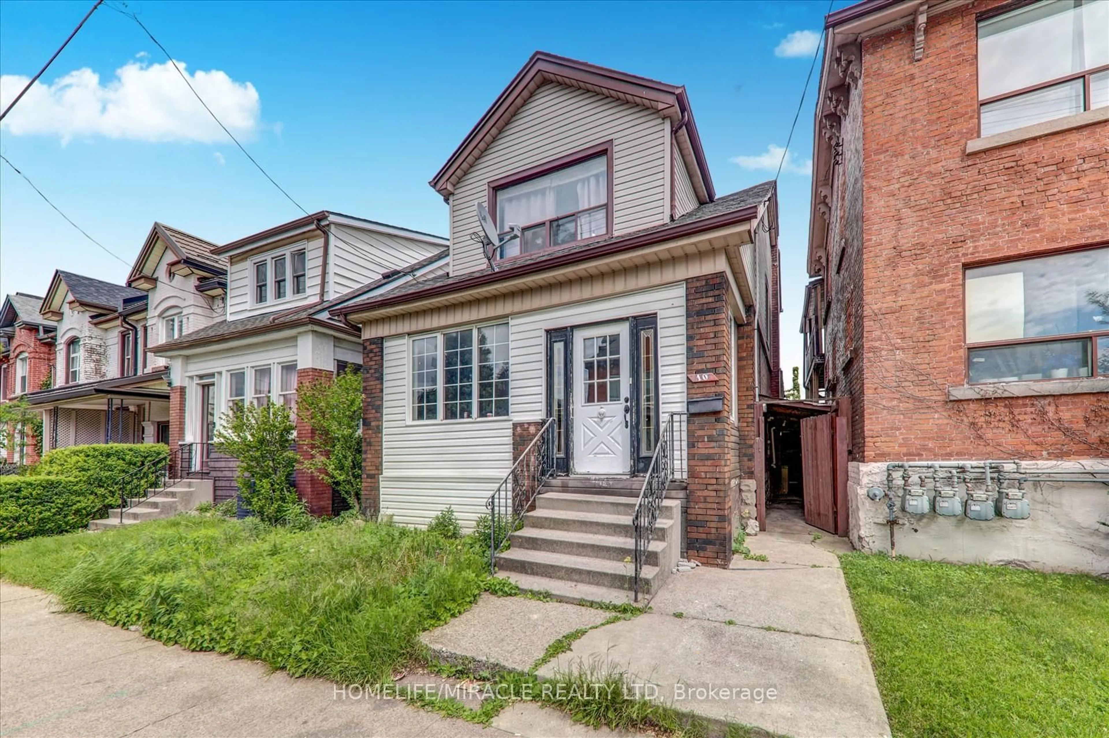 Home with brick exterior material, street for 10 St Matthews Ave, Hamilton Ontario L8L 5P3