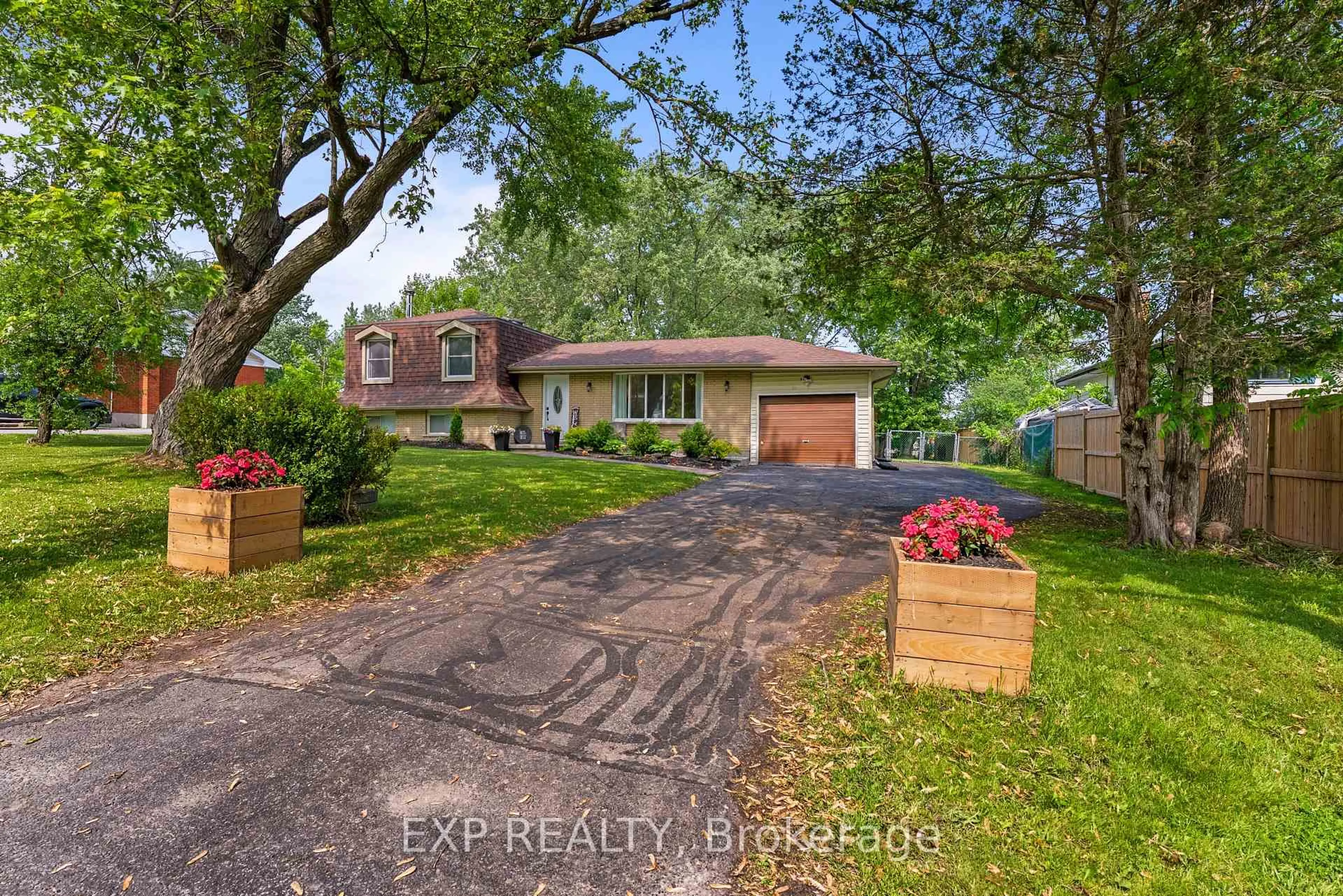 A pic from outside/outdoor area/front of a property/back of a property/a pic from drone, street for 512 Whites Rd, Trenton Ontario K8V 5P8