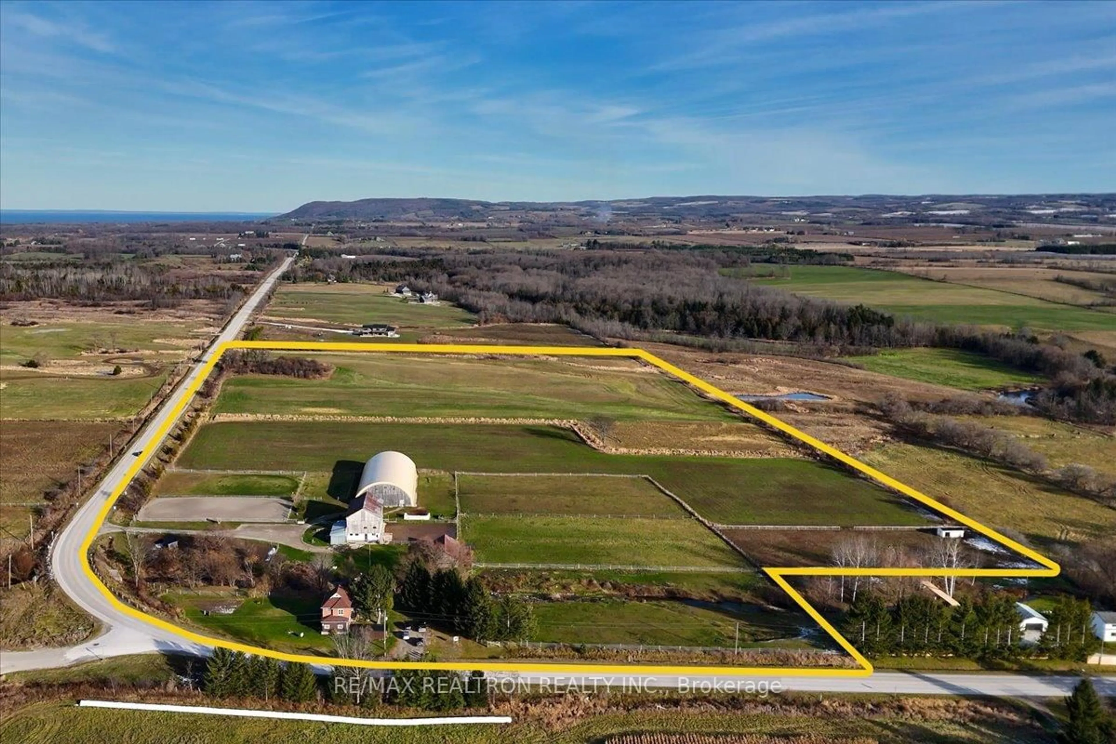 A pic from outside/outdoor area/front of a property/back of a property/a pic from drone, unknown for 236787 13 Grey Rd, Blue Mountains Ontario N0H 1J0