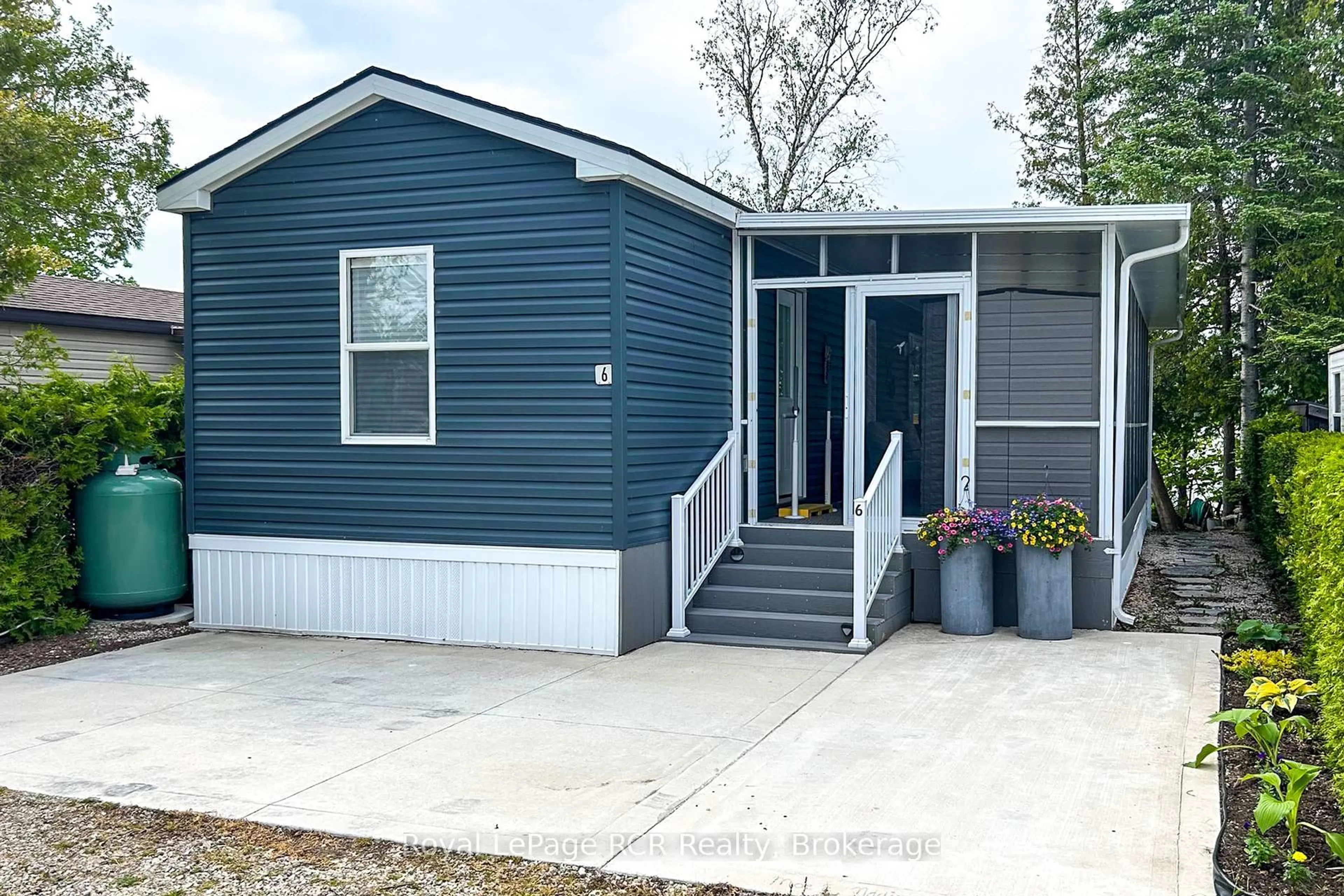 Home with vinyl exterior material, street for 2905 Bruce Rd 13 #Unit # 6, South Bruce Peninsula Ontario N0H 2T0