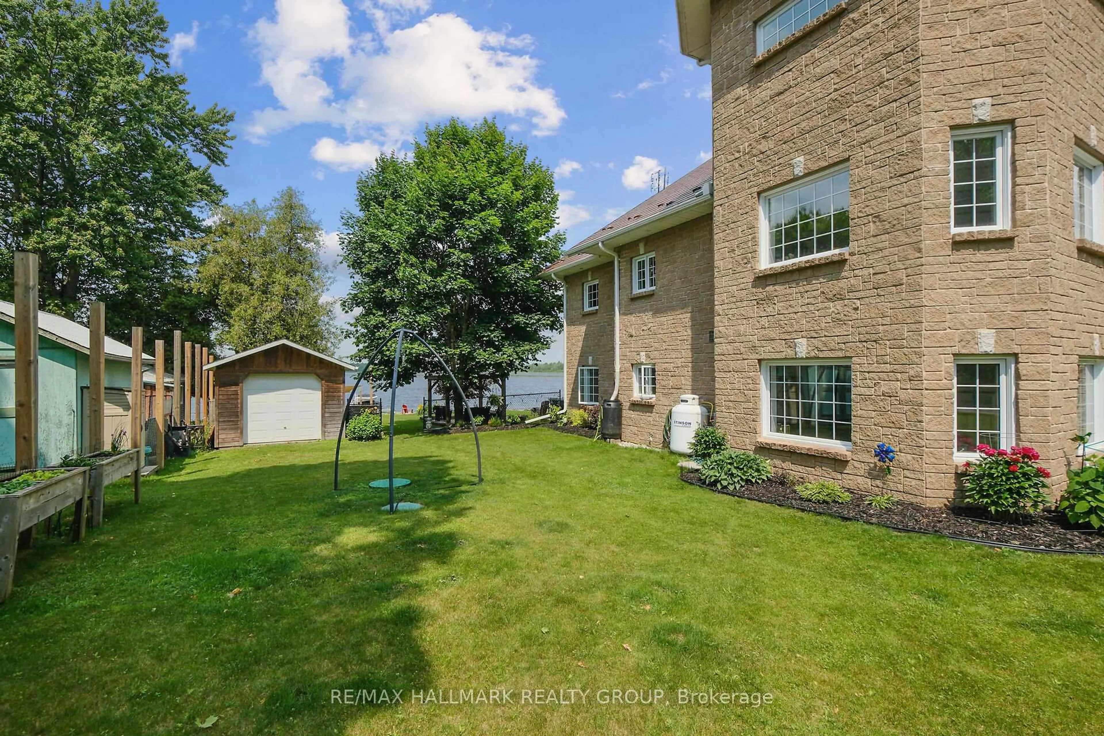 A pic from outside/outdoor area/front of a property/back of a property/a pic from drone, water/lake/river/ocean view for 36 R1 Rd, Rideau Lakes Ontario K7A 0C9