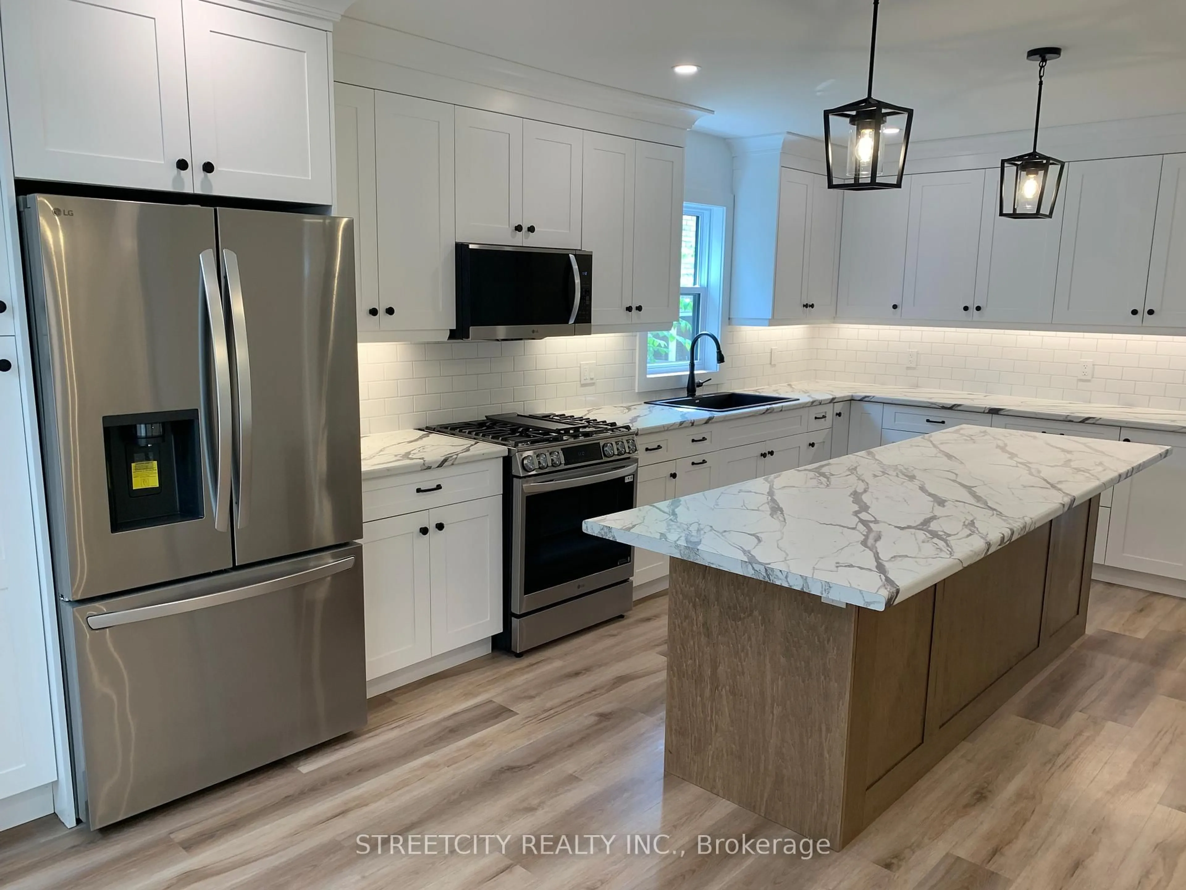 Open concept kitchen, ceramic/tile floor for 481 Gold St, Warwick Ontario N0M 0B9