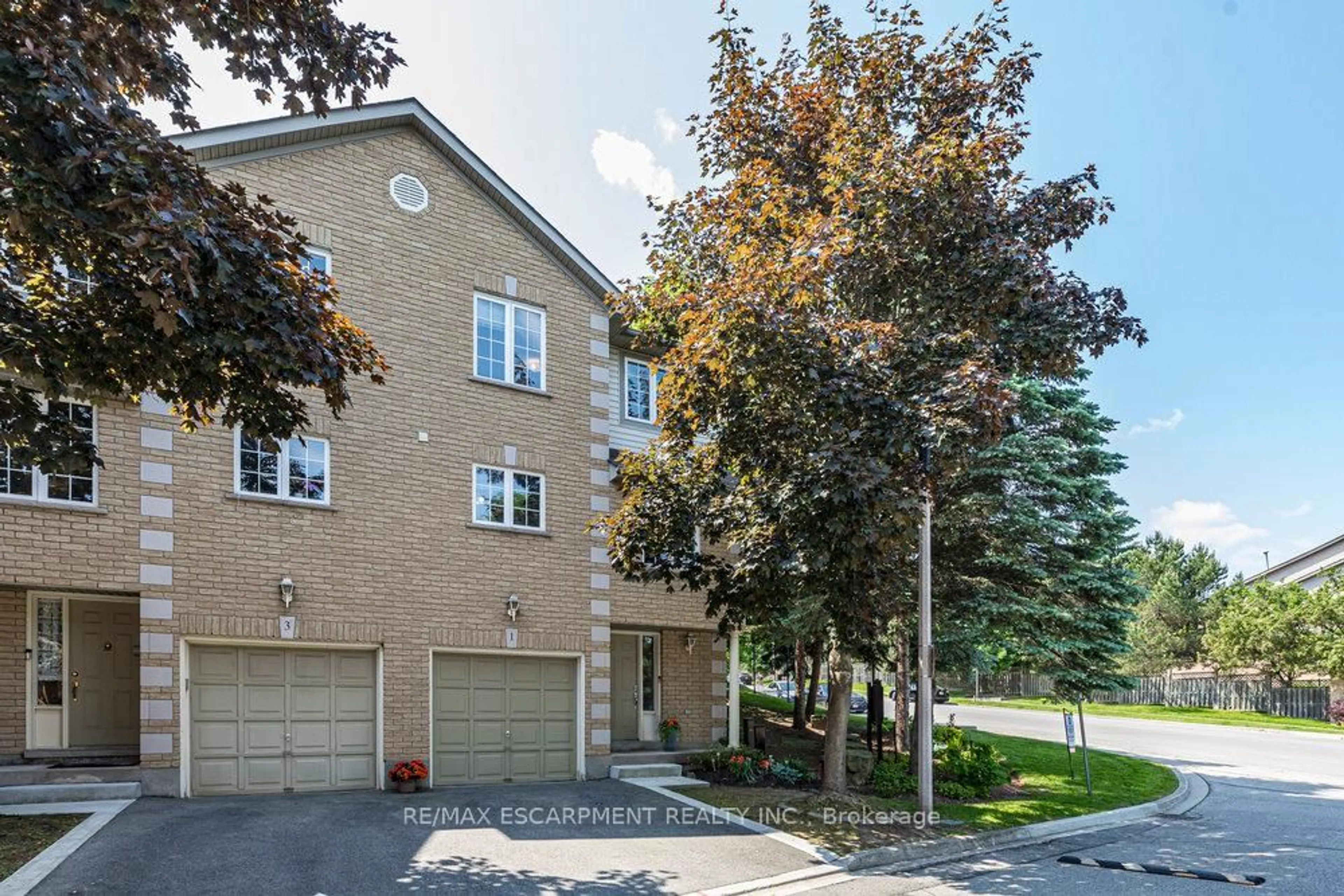 Home with brick exterior material, street for 31 Moss Blvd #1, Hamilton Ontario L9H 7A6