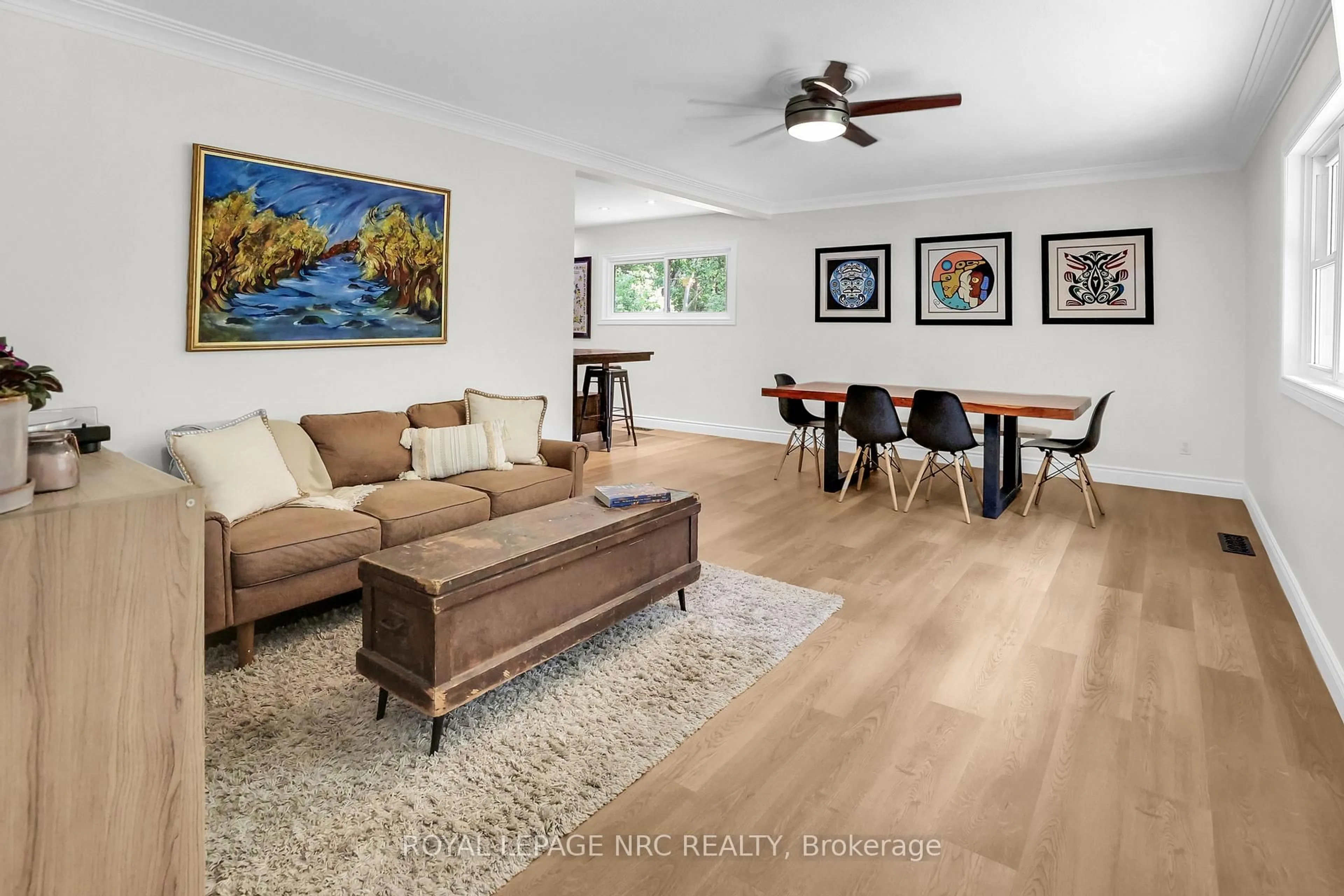 Living room with furniture, wood/laminate floor for 577 Canboro Rd, Pelham Ontario L0S 1C0