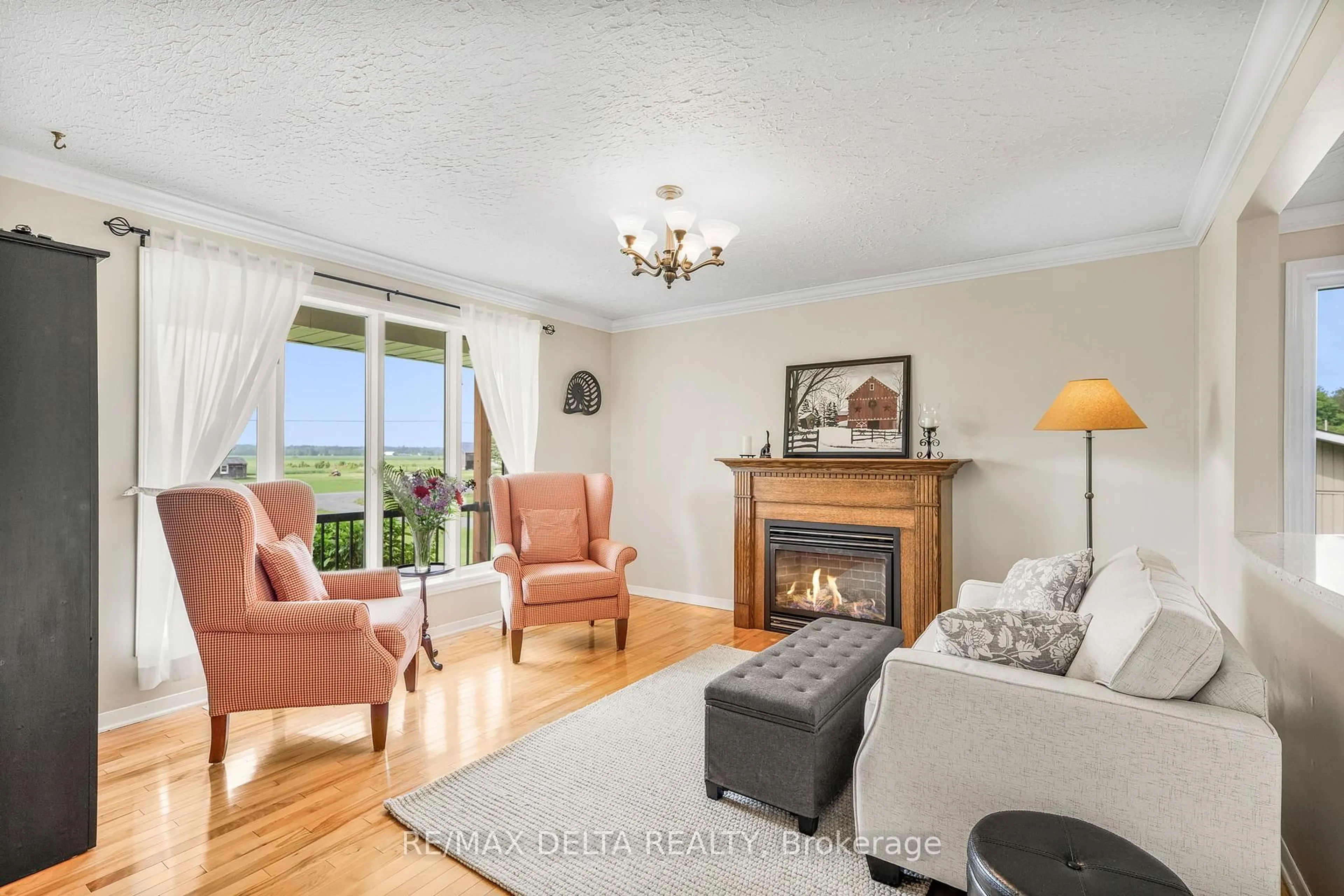 Living room with furniture, wood/laminate floor for 1730 Concession 6 Rd, Alfred and Plantagenet Ontario K0B 1L0