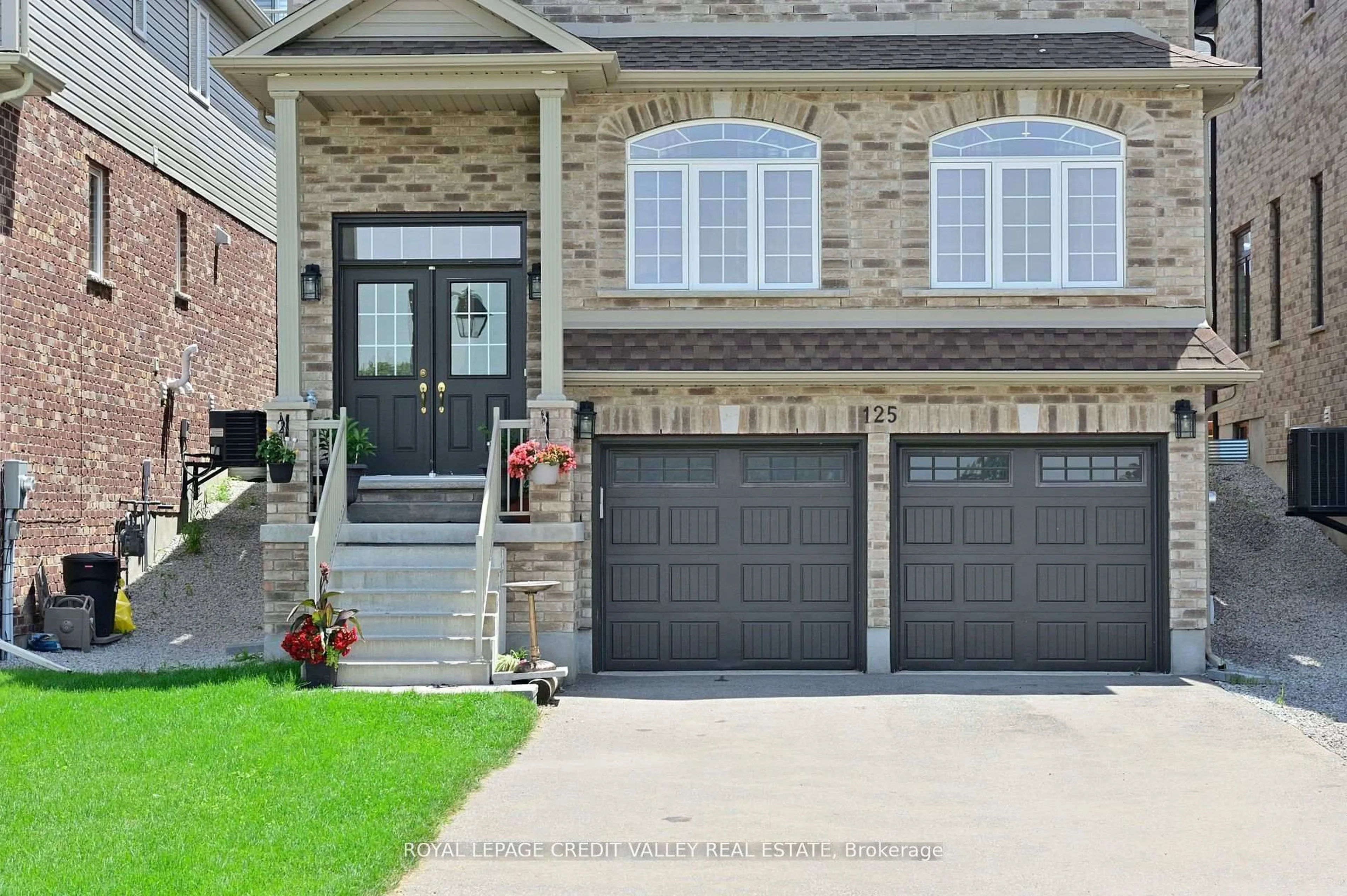 Home with brick exterior material, street for 125 Gagnon Pl, Guelph/Eramosa Ontario N0B 2K0