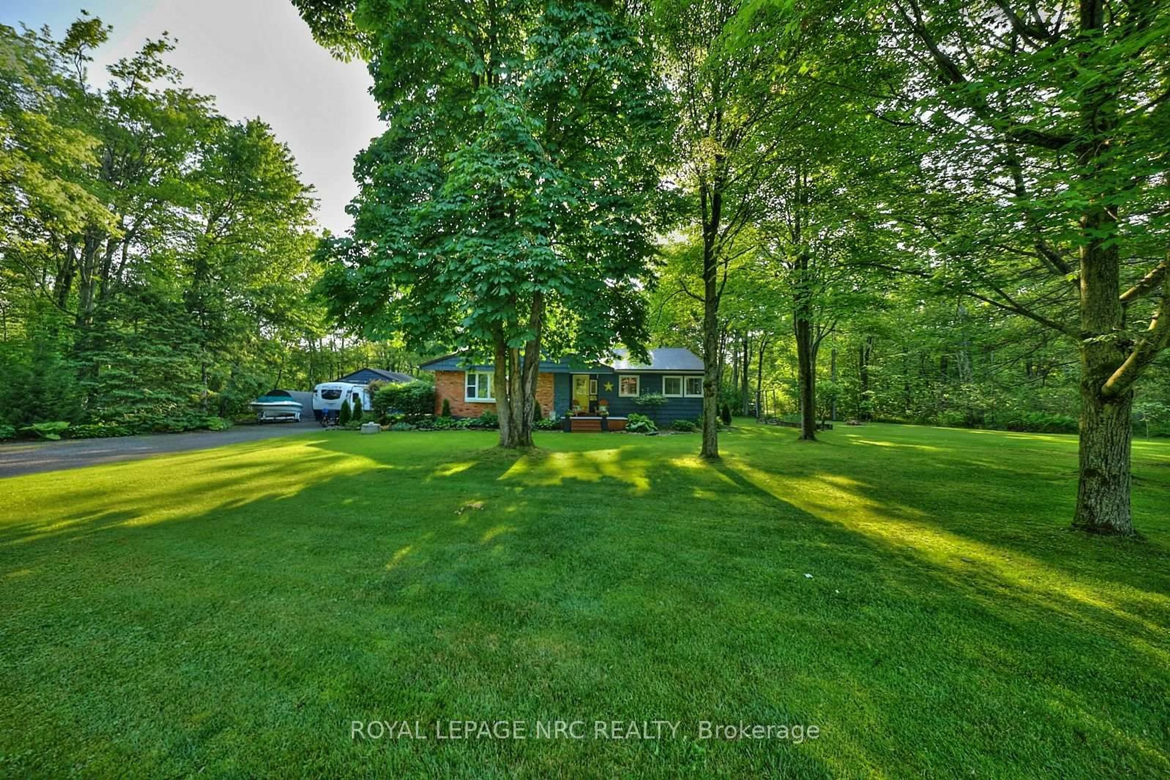A pic from outside/outdoor area/front of a property/back of a property/a pic from drone, forest/trees view for 599 Wyldewood Rd, Port Colborne Ontario L0S 1R0