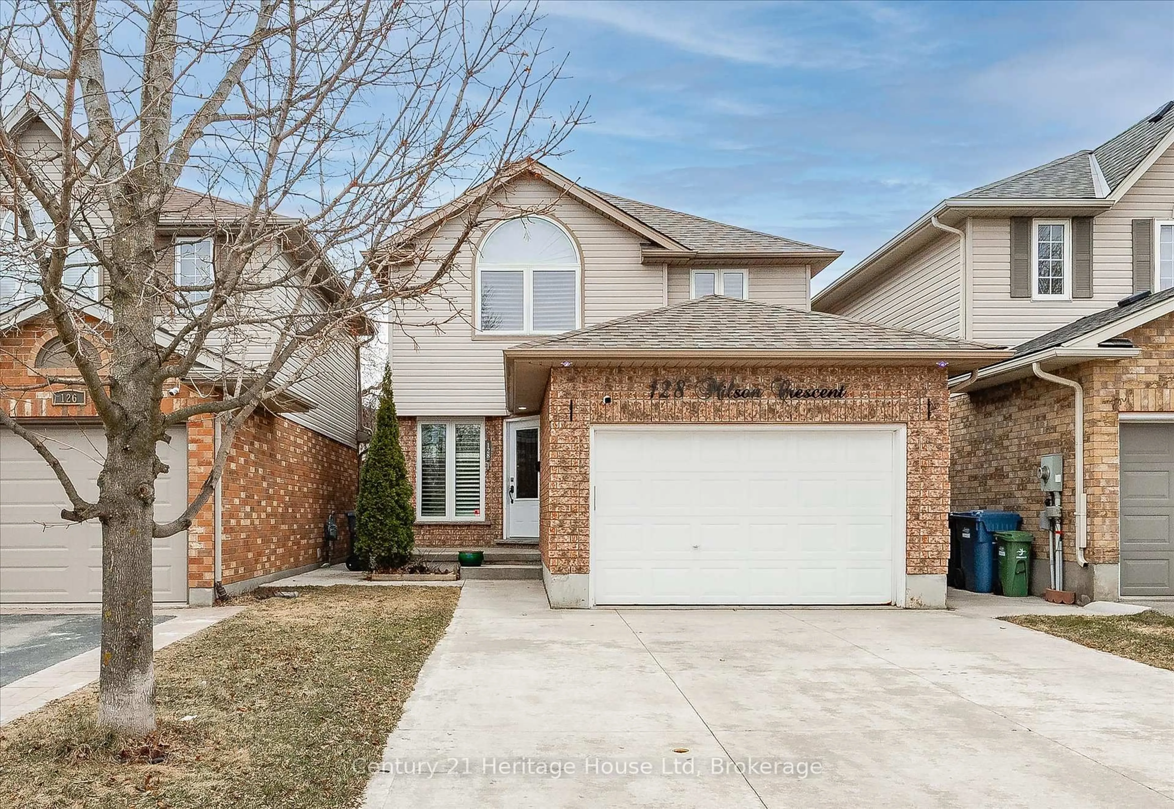 Home with brick exterior material, street for 128 Milson Cres, Guelph Ontario N1C 1G5