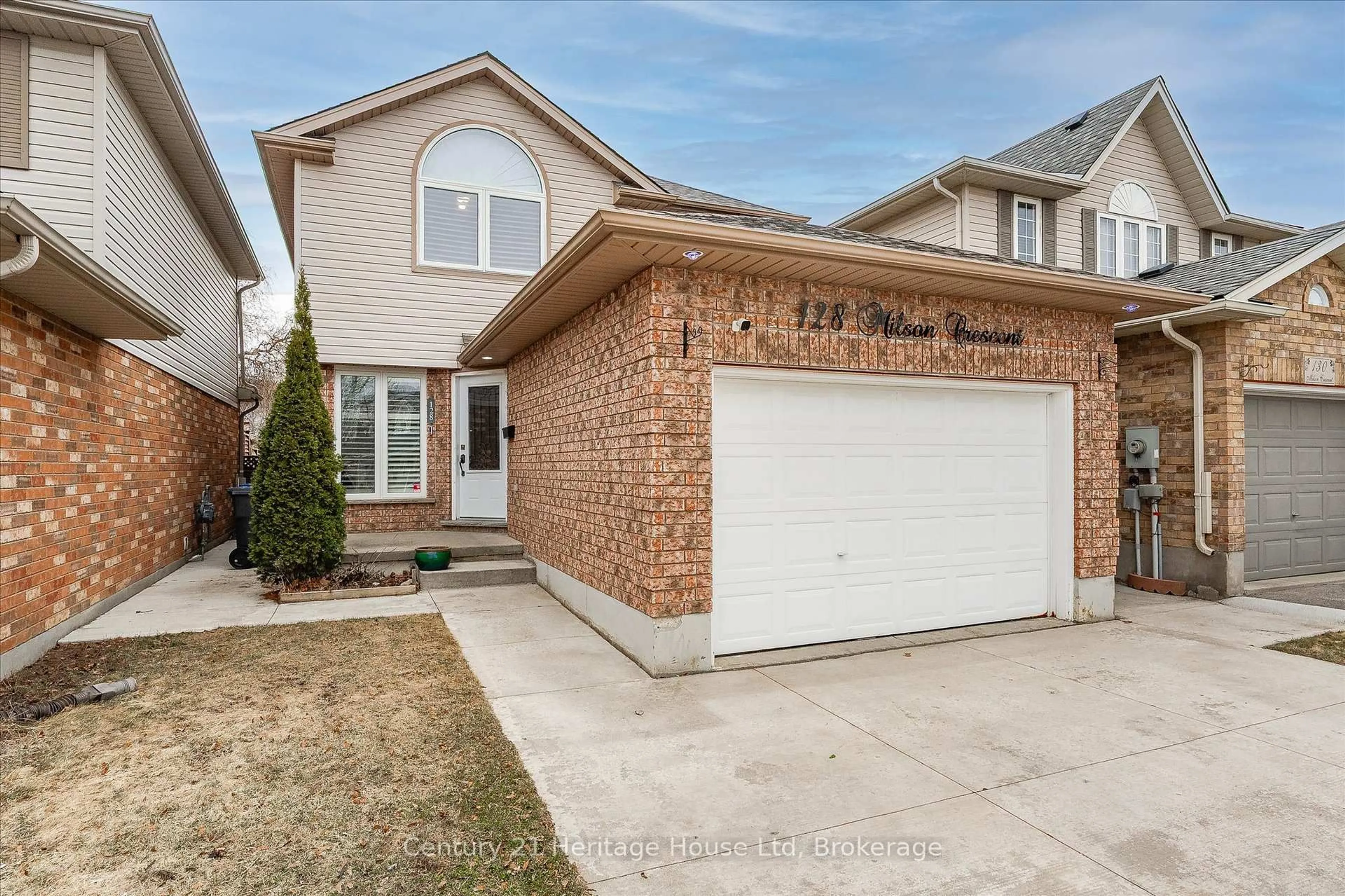 Home with brick exterior material, street for 128 Milson Cres, Guelph Ontario N1C 1G5
