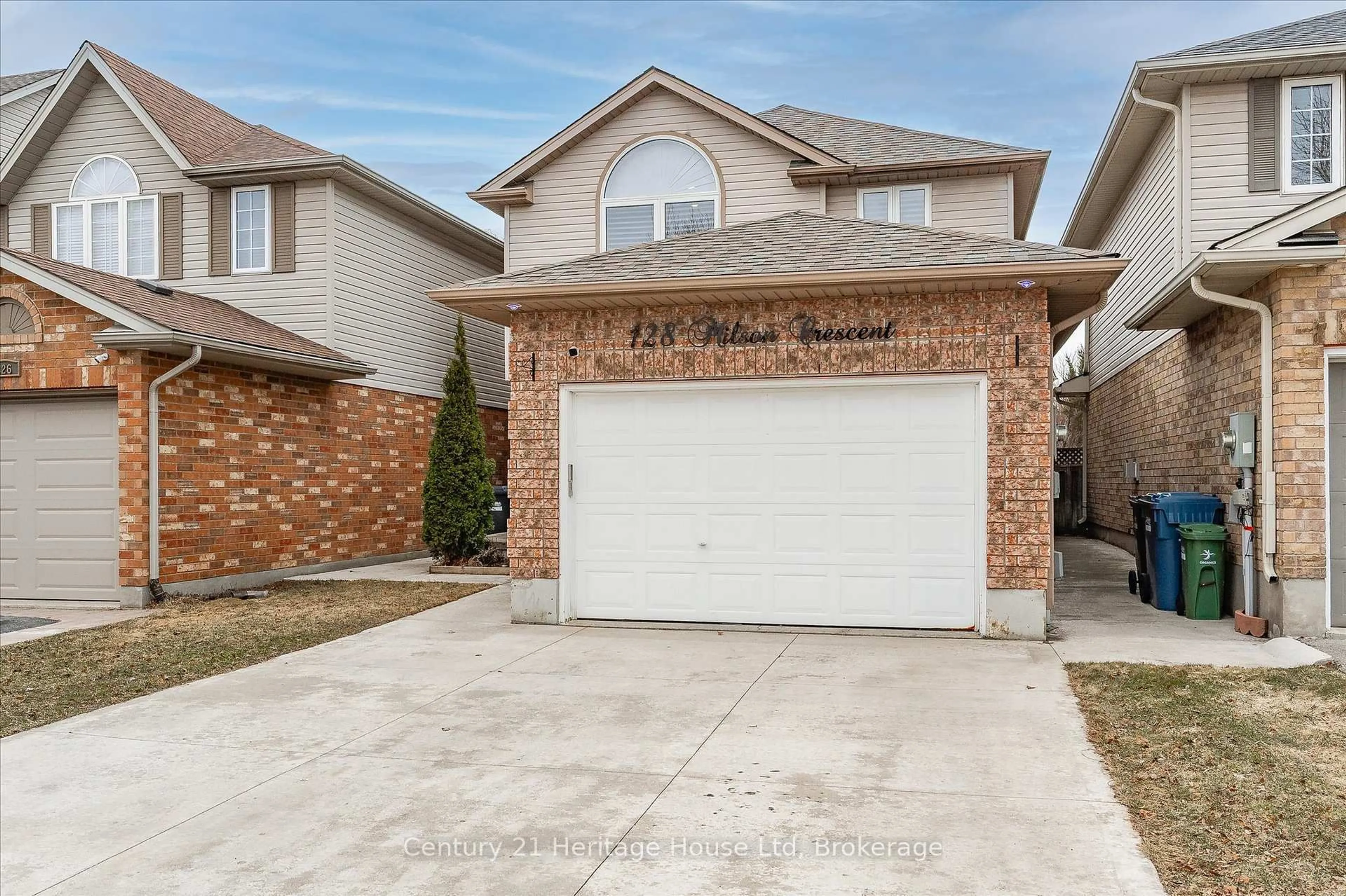 Home with brick exterior material, street for 128 Milson Cres, Guelph Ontario N1C 1G5