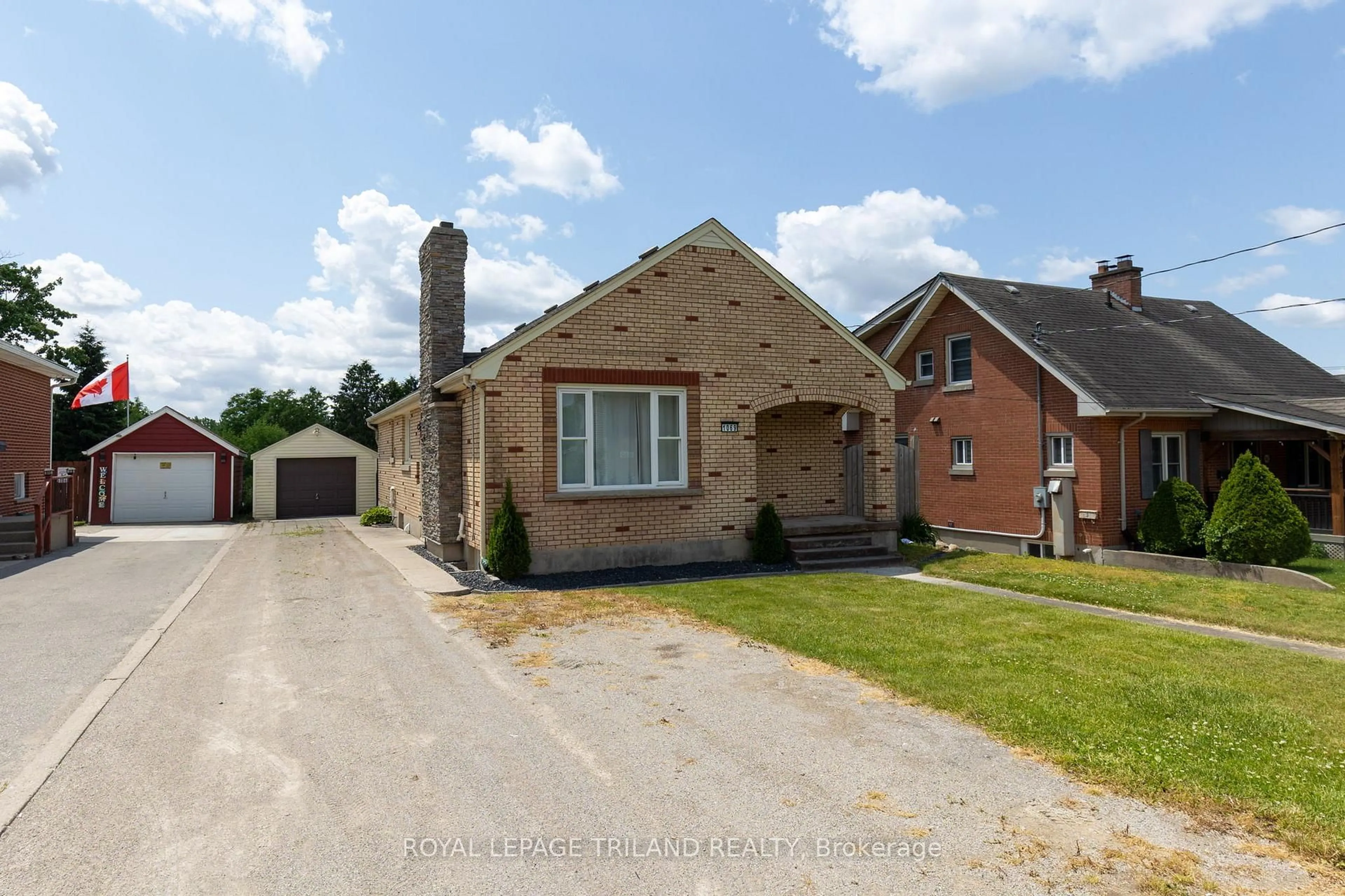 Home with brick exterior material, street for 1069 Hamilton Rd, London East Ontario N5W 1A7