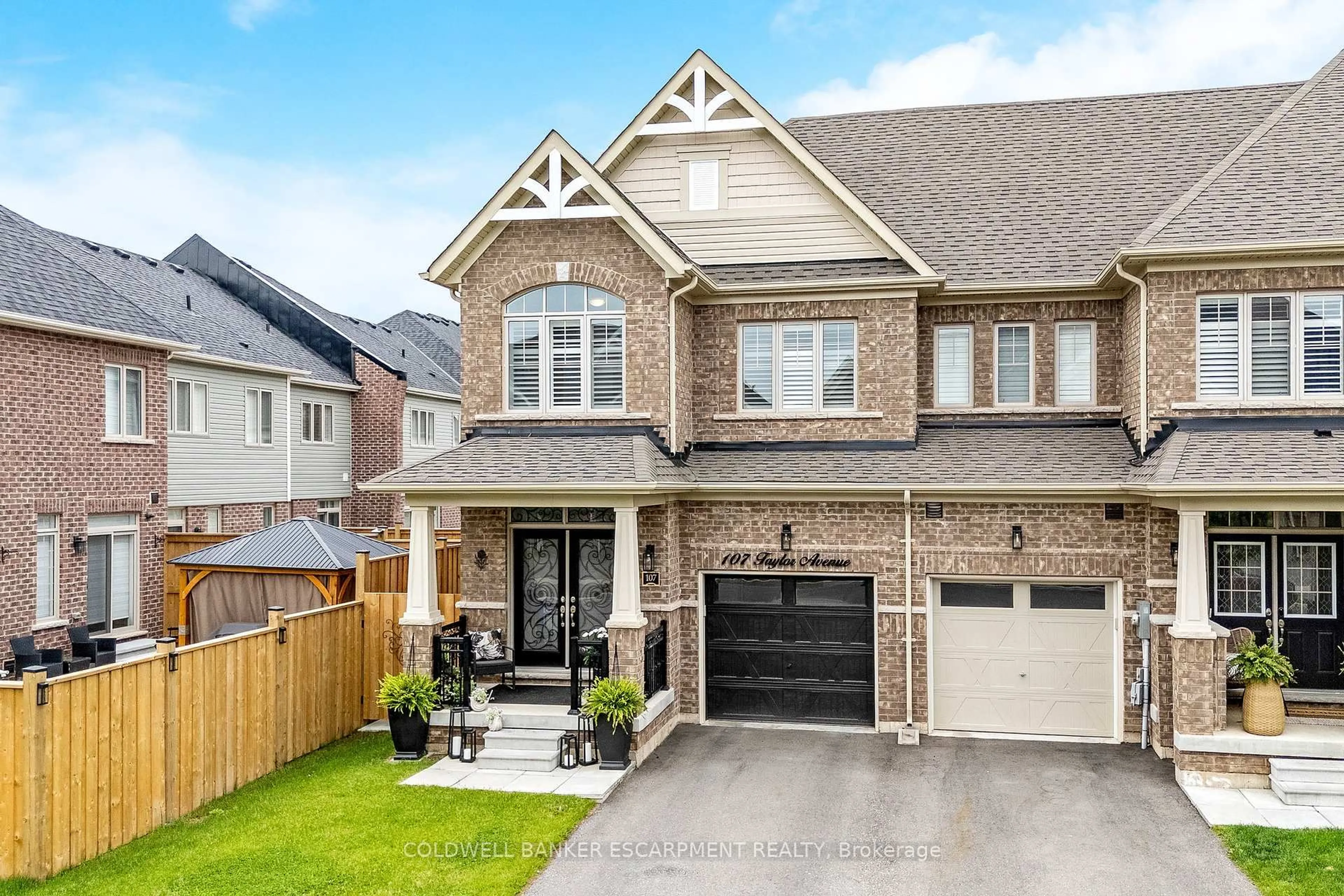 Home with brick exterior material, street for 107 Taylor Ave, Guelph/Eramosa Ontario N0B 2K0