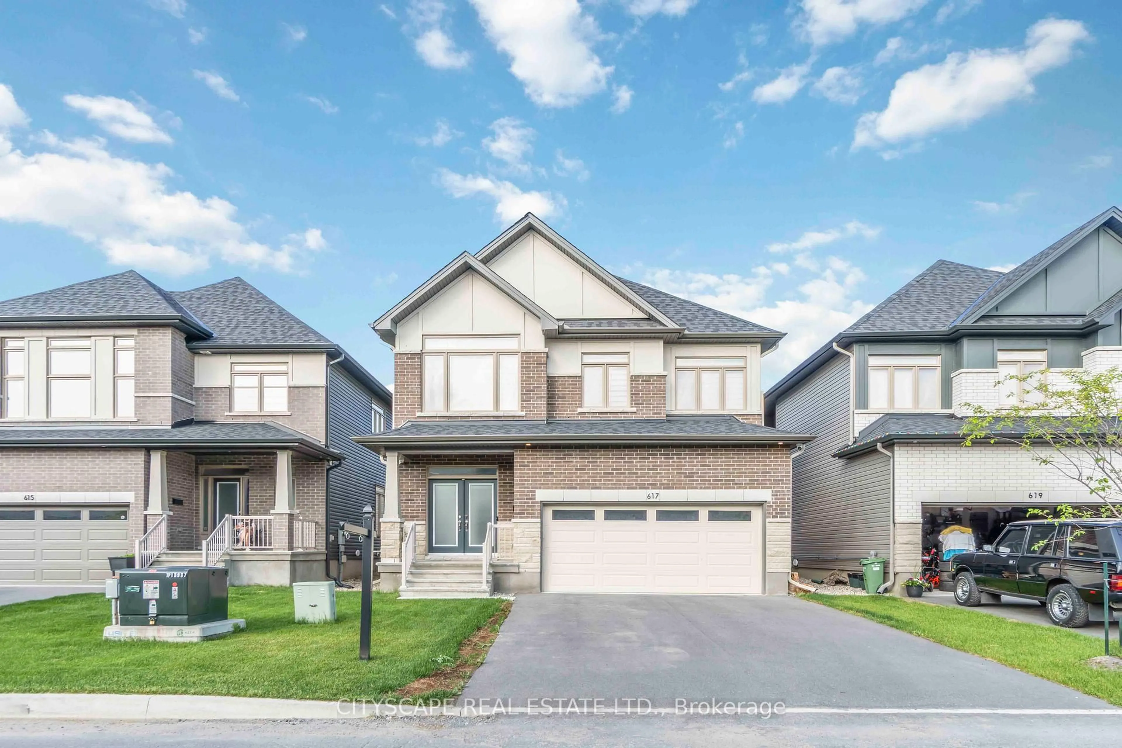 Home with vinyl exterior material, street for 617 Kenabeek Terr, Ottawa Ontario K4M 0B3