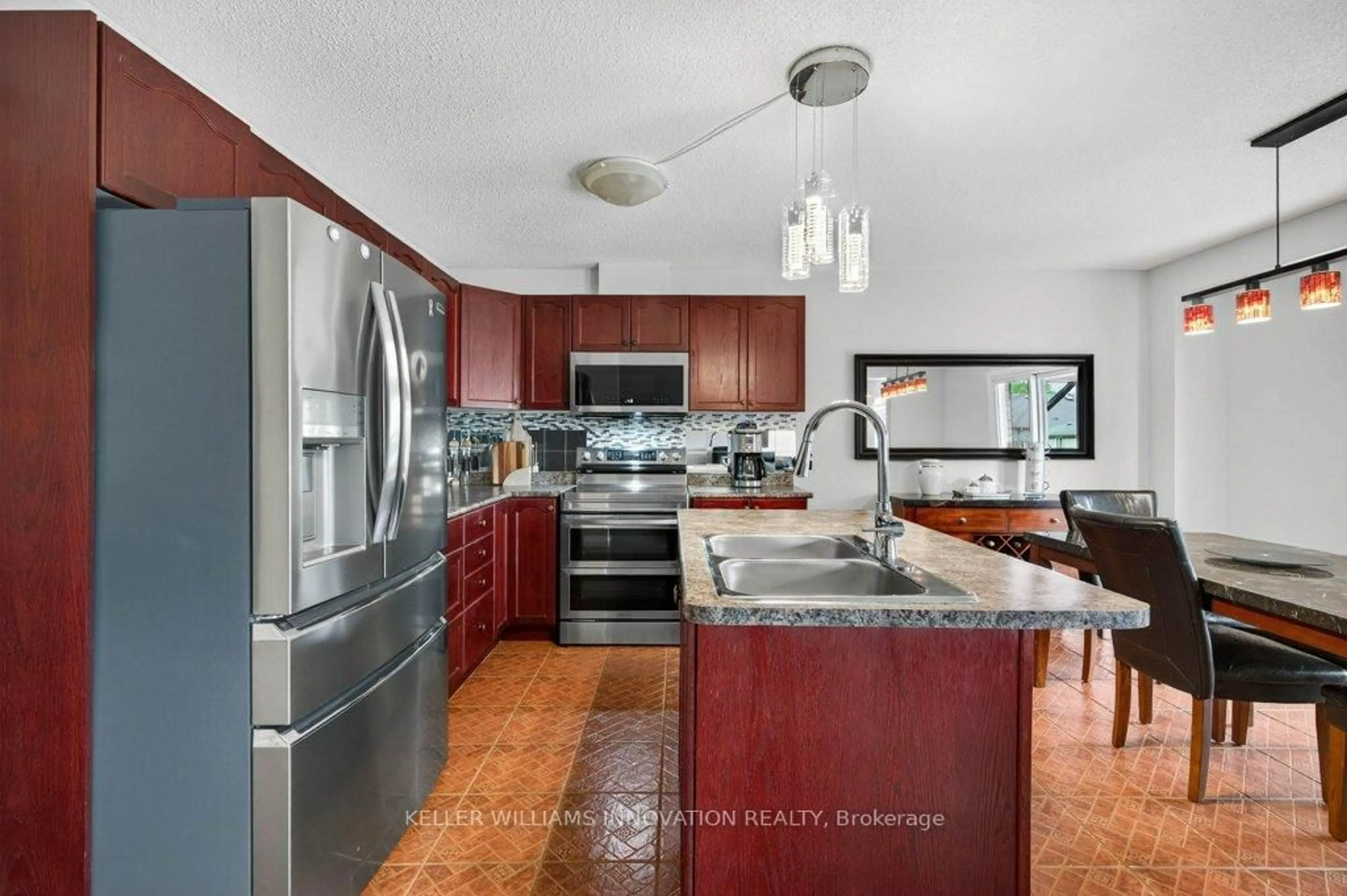Open concept kitchen, ceramic/tile floor for 324 Beaumont Cres, Kitchener Ontario N2A 0A7